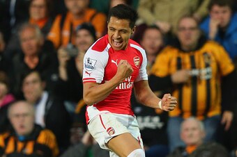 HULL, ENGLAND - MAY 04:  Alexis Sanchez of Arsenal celebrates as he scores their first goal during the Barclays Premier League match between Hull City and Arsenal at KC Stadium on May 4, 2015 in Hull, England.  (Photo by Alex Livesey/Getty Images)
