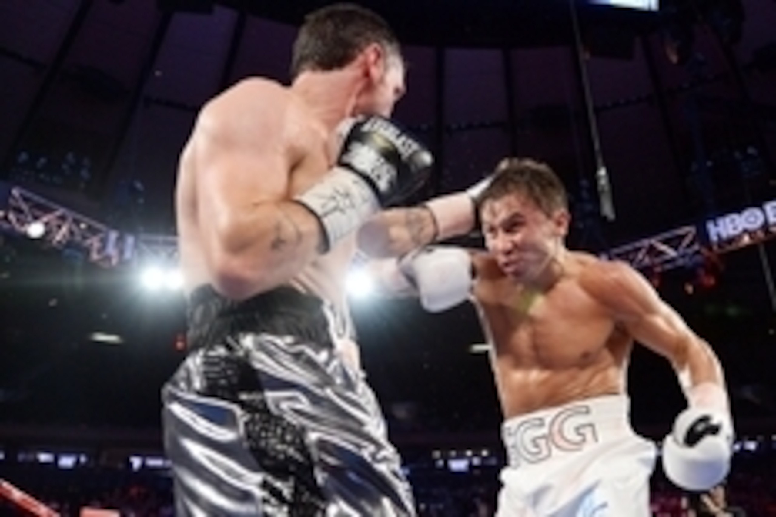 Jul 26, 2014; New York, NY, USA; Gennady Golovkin (white gloves) and Daniel Geale (black gloves) box during their middleweight championship bout at Madison Square Garden. Golovkin won via third round knockout. Mandatory Credit: Joe Camporeale-USA TODAY Sp