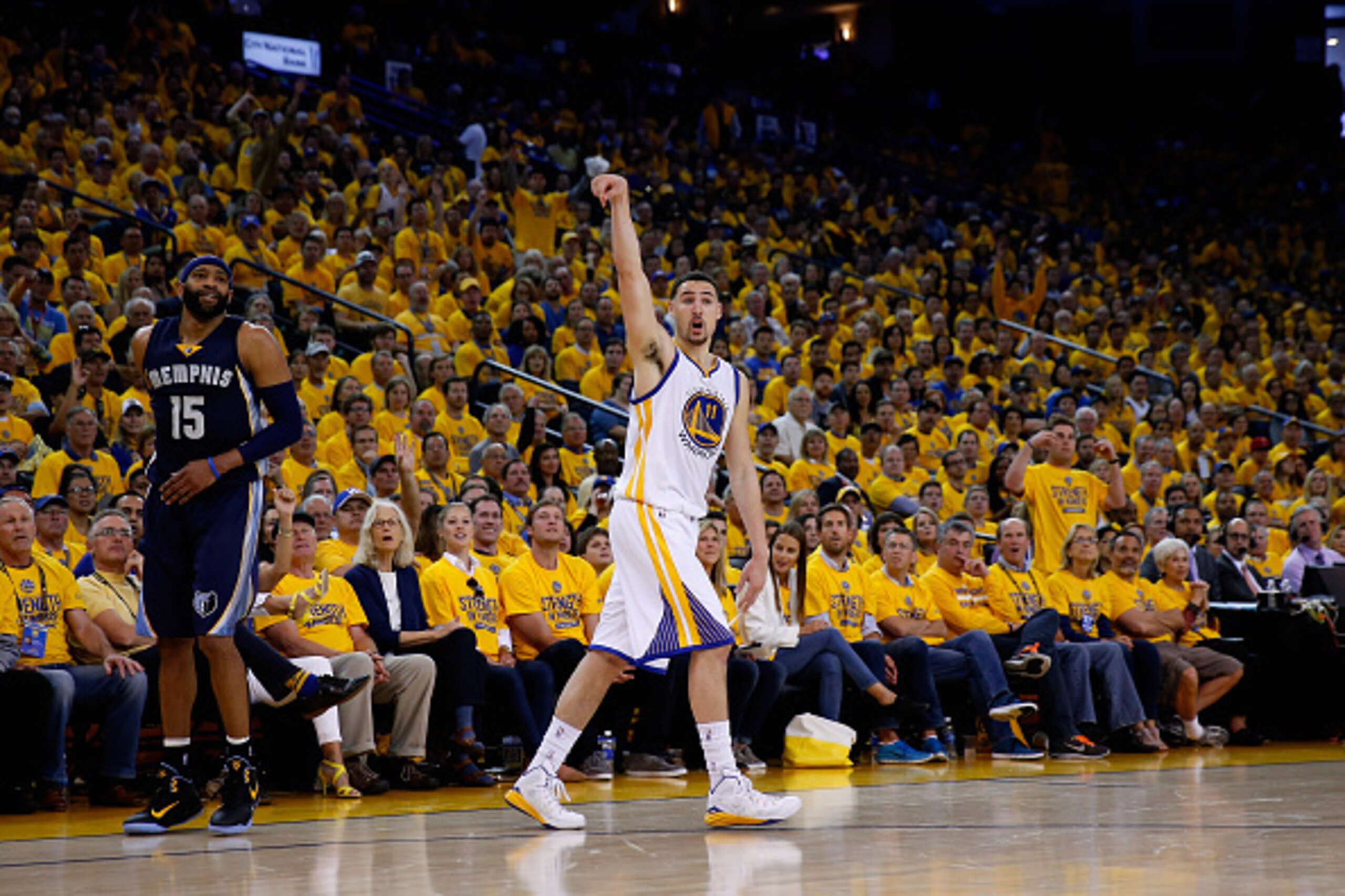 OAKLAND, CA - MAY 03:  Klay Thompson #11 of the Golden State Warriors watches a three-pointer go through the basket against the Memphis Grizzlies during Game One of the Western Conference Semifinals during the NBA Playoffs on May 3, 2015 at Oracle Arena i