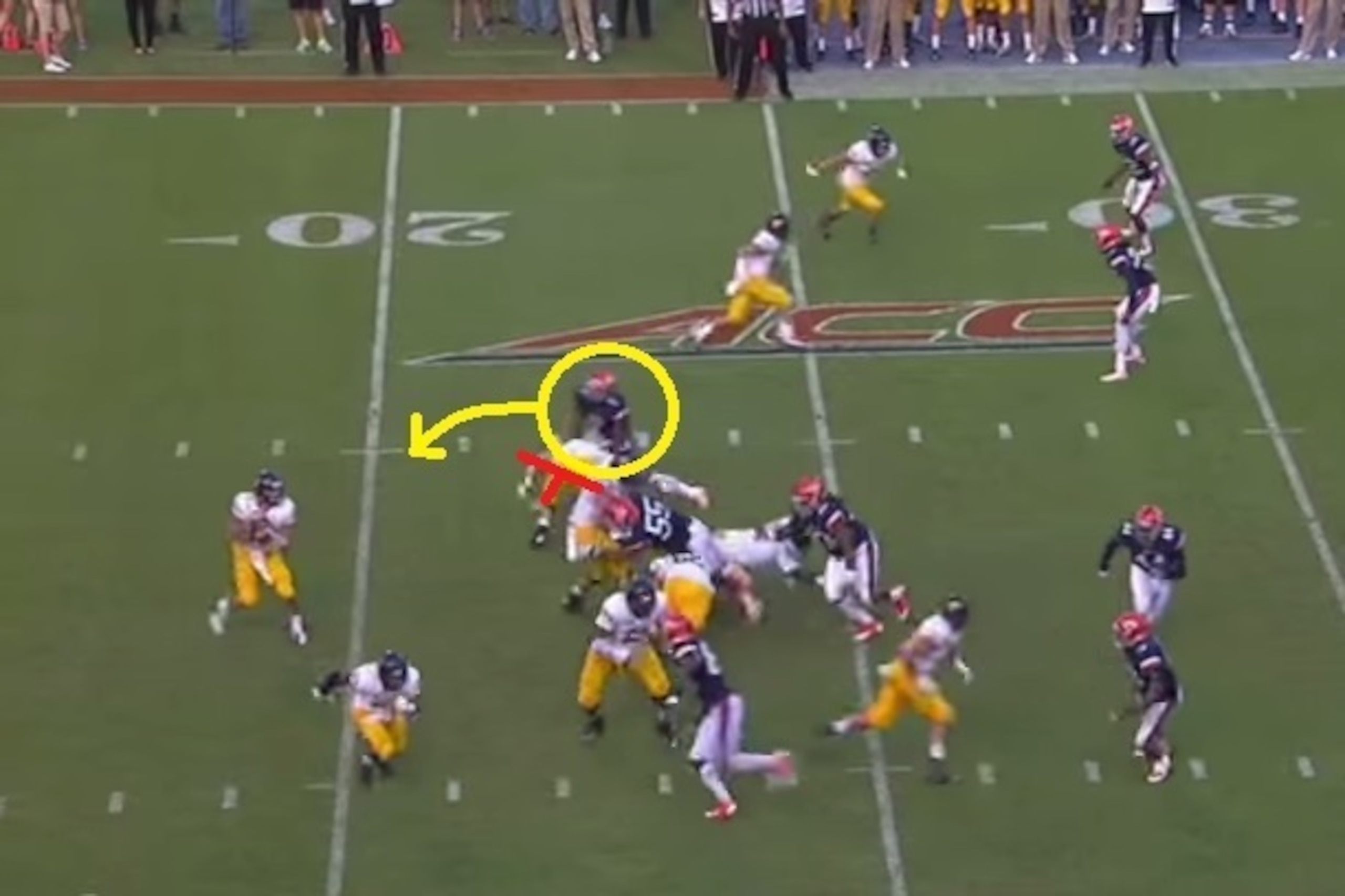 Harold will rush toward the pocket despite blocking efforts from Kent State's left tackle.