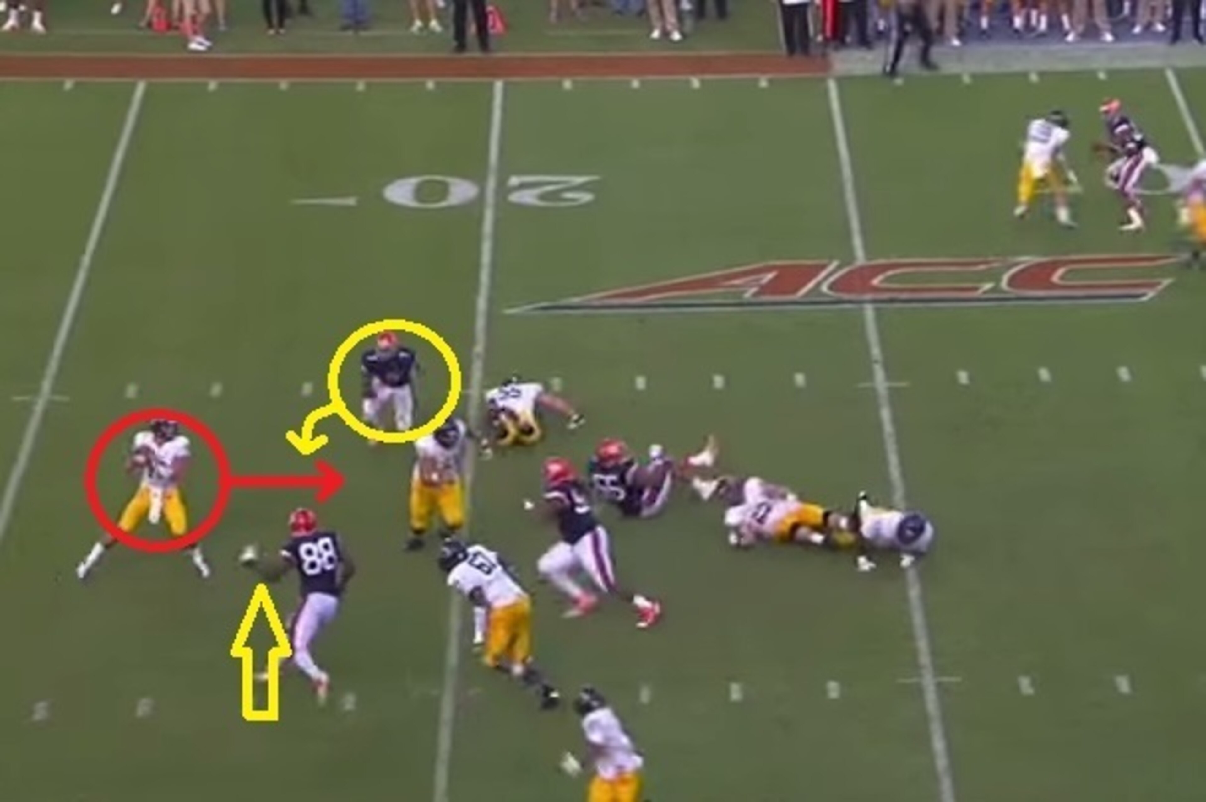 Kent State's quarterback attempts to move up in the pocket, but pressure from a defensive end limits his options. Kent State's quarterback attempts to move up in the pocket, but pressure from a defensive end limits his options.