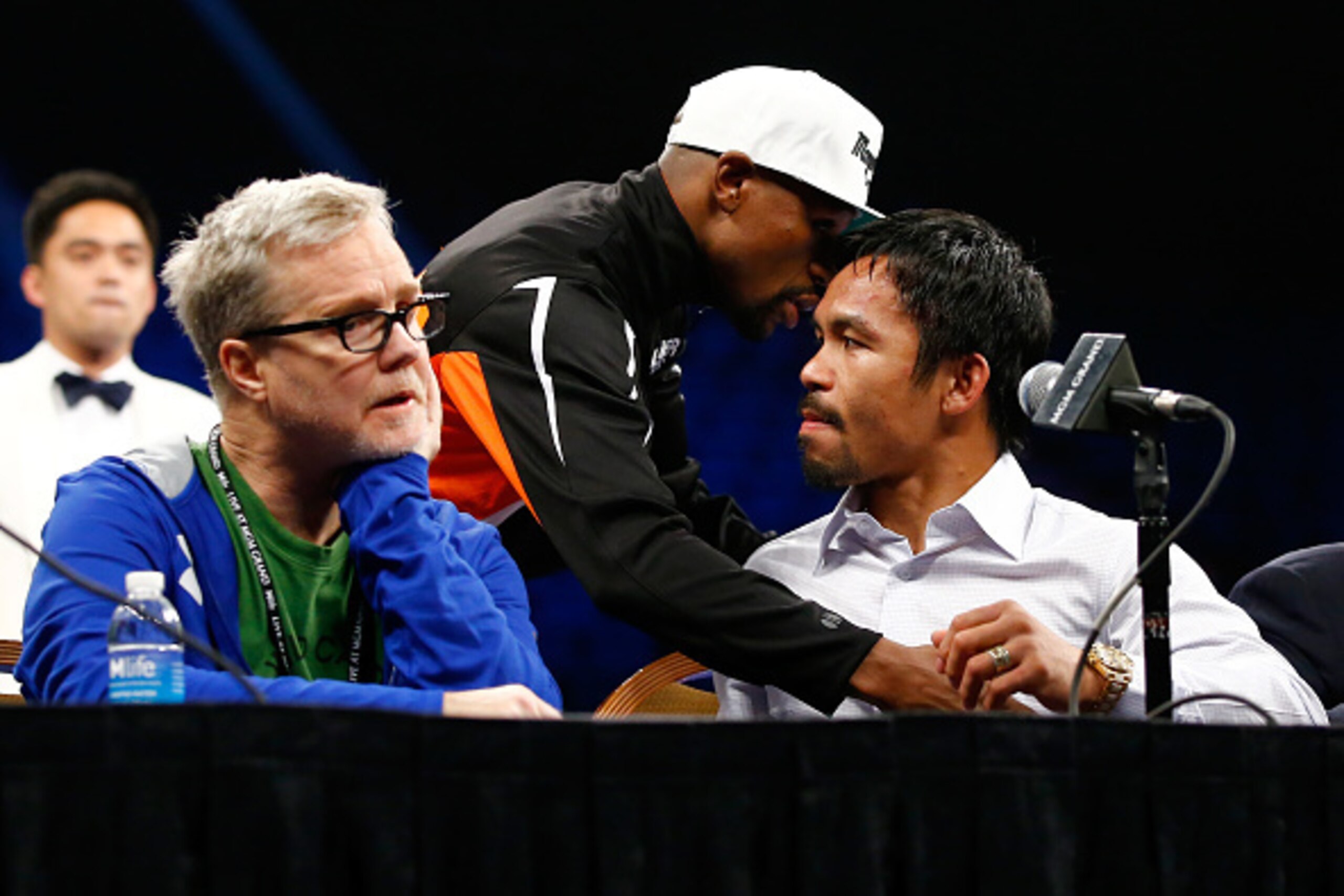 LAS VEGAS, NV - MAY 02: Floyd Mayweather hugs Manny Pacquiao during their post-fight news conference after Mayweather Jr.'s unanimous decision victory in their welterweight unification championship bout on May 2, 2015 at MGM Grand Garden Arena in Las Veg LAS VEGAS, NV - MAY 02: Floyd Mayweather hugs Manny Pacquiao during their post-fight news conference after Mayweather Jr.'s unanimous decision victory in their welterweight unification championship bout on May 2, 2015 at MGM Grand Garden Arena in Las Veg