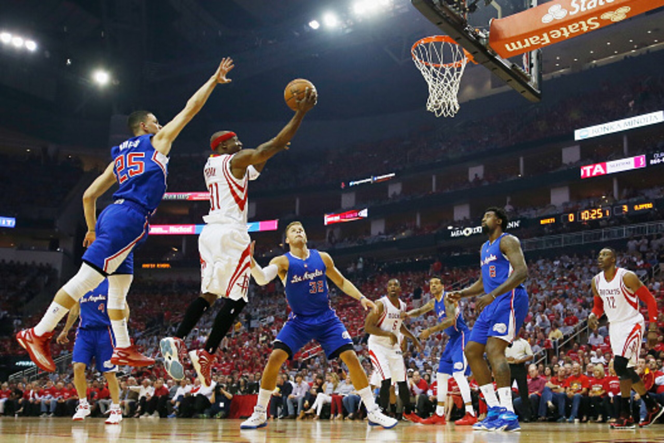 HOUSTON, TX - MAY 04:  Jason Terry #31 of the Houston Rockets takes a shot over Austin Rivers #25 of the Los Angeles Clippers during Game One in the Western Conference Semifinals of the 2015 NBA Playoffs on May 4, 2015 at the Toyota Center in Houston, Tex