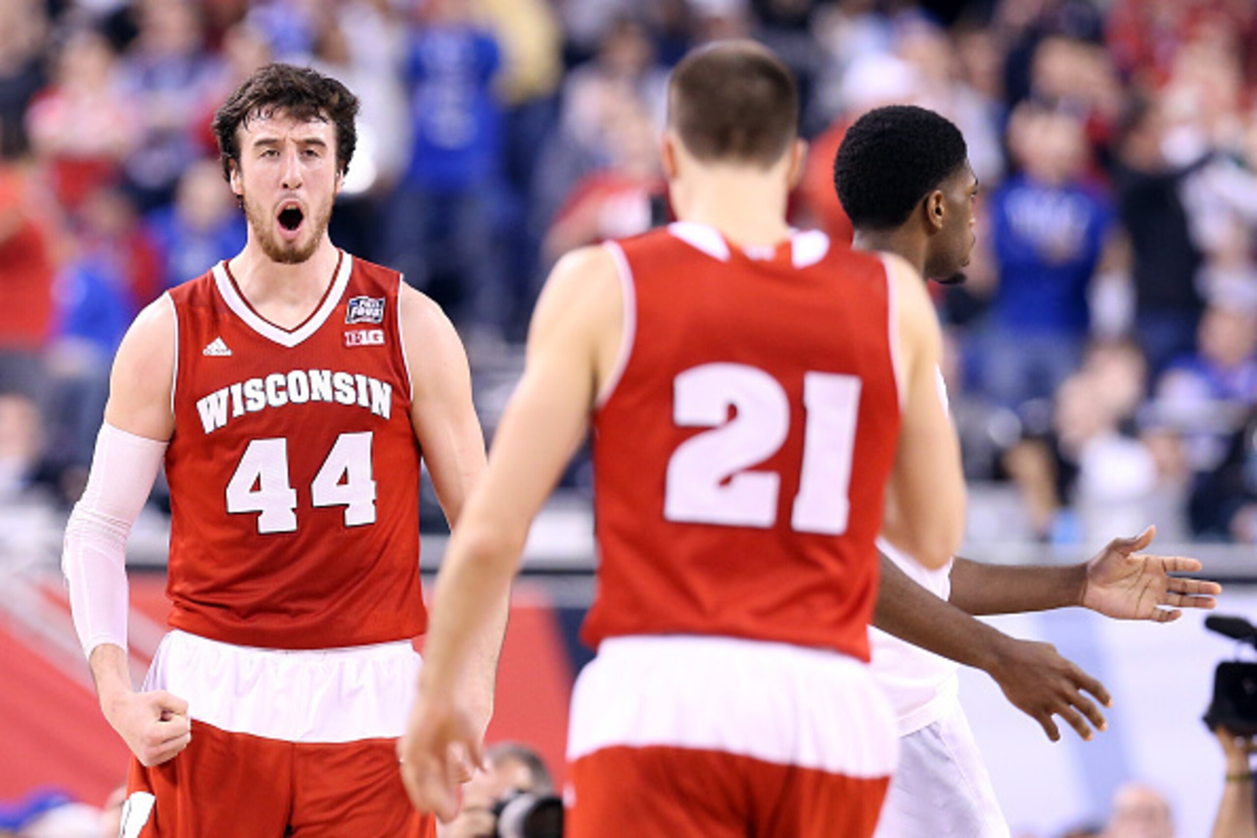 INDIANAPOLIS, IN - APRIL 06:  Frank Kaminsky #44 of the Wisconsin Badgers reacts after a play in the first half against the Duke Blue Devils during the NCAA Men's Final Four National Championship at Lucas Oil Stadium on April 6, 2015 in Indianapolis, Indi