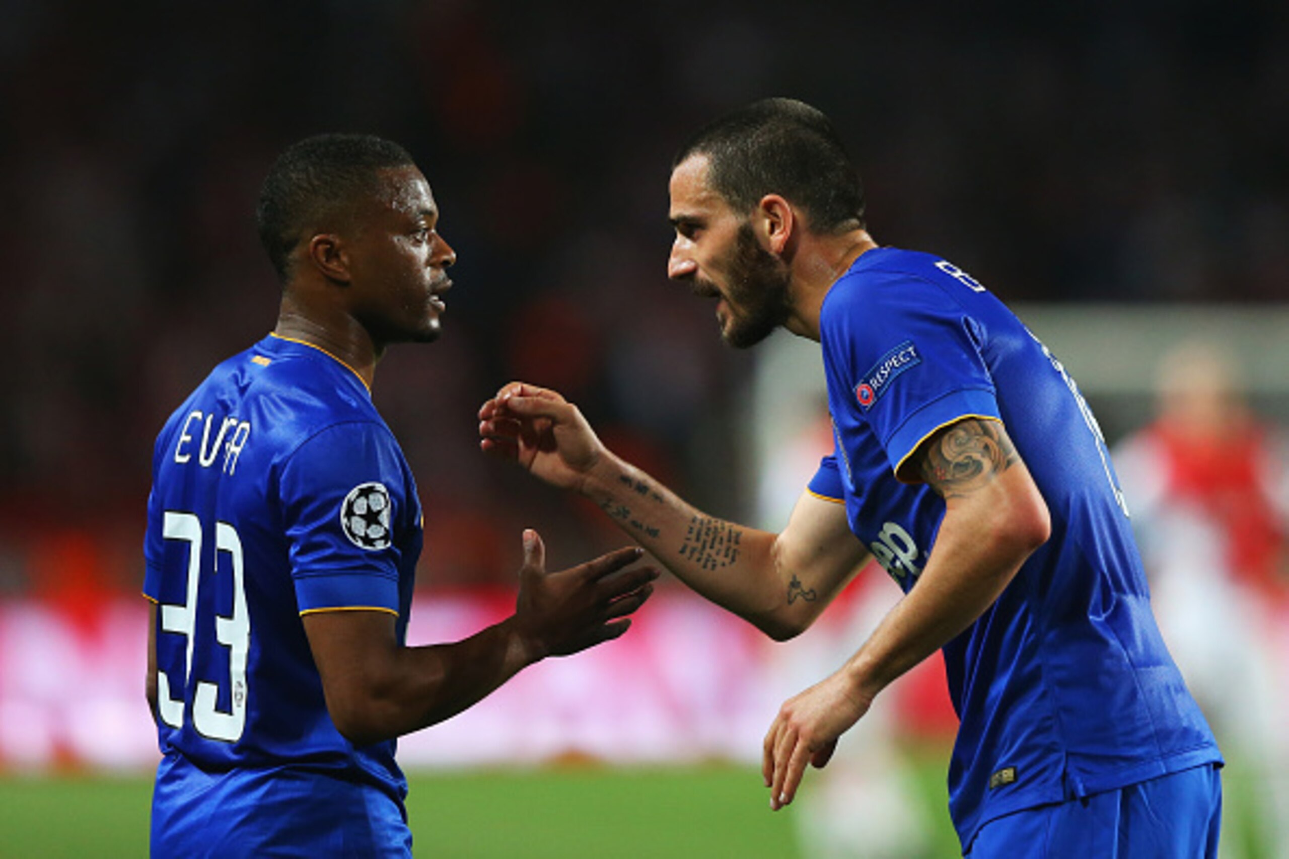 MONACO - APRIL 22: Patrice Evra (L) of Juventus talks to Leonardo Bonucci of Juventus during the UEFA Champions League quarter-final second leg match between AS Monaco FC and Juventus at Stade Louis II on April 22, 2015 in Monaco, Monaco.  (Photo by Alex 