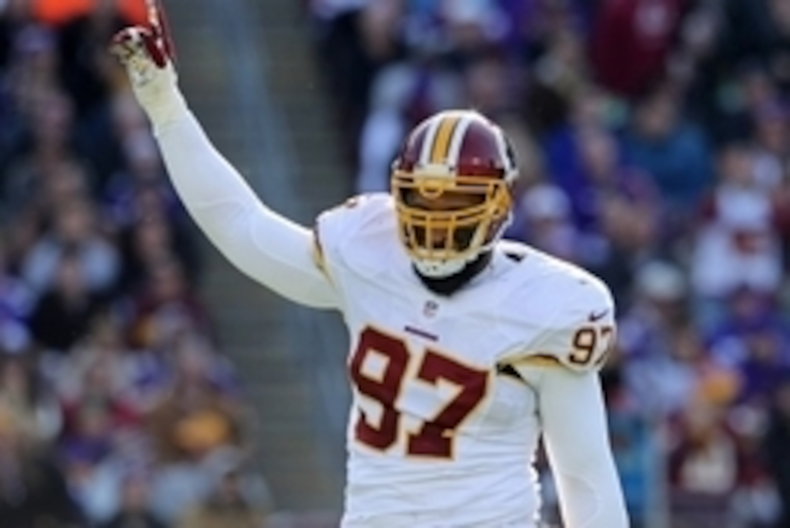 Nov 2, 2014; Minneapolis, MN, USA; Washington Redskins defensive end Jason Hatcher (97) celebrates his sack during the second quarter against the Minnesota Vikings at TCF Bank Stadium. Mandatory Credit: Brace Hemmelgarn-USA TODAY Sports