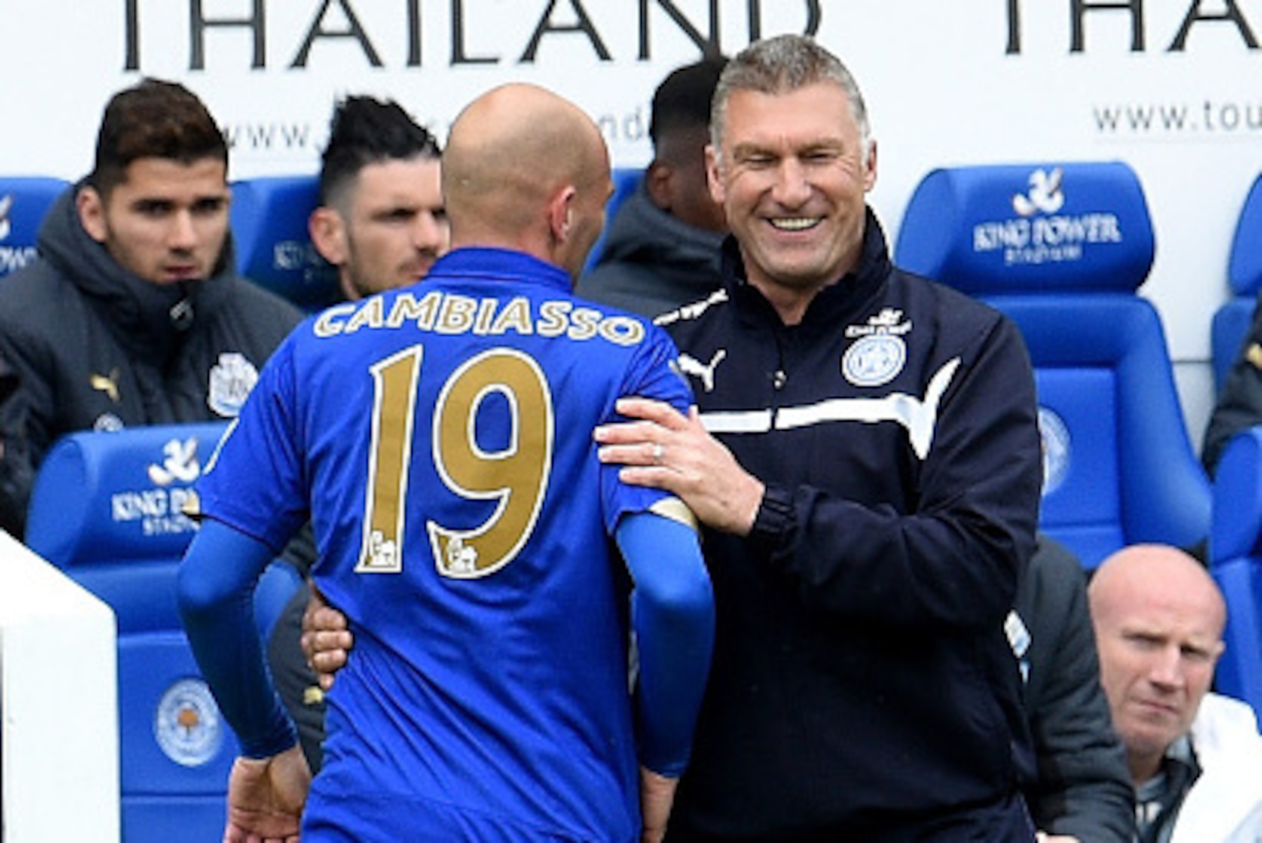 LEICESTER, ENGLAND - MAY 02:  Nigel Pearson the Leicester manager and Esteban Cambiasso during the Barclays Premier League match between Leicester City and Newcastle United at The King Power Stadium on May 2, 2015 in Leicester, England.  (Photo by Ross Ki