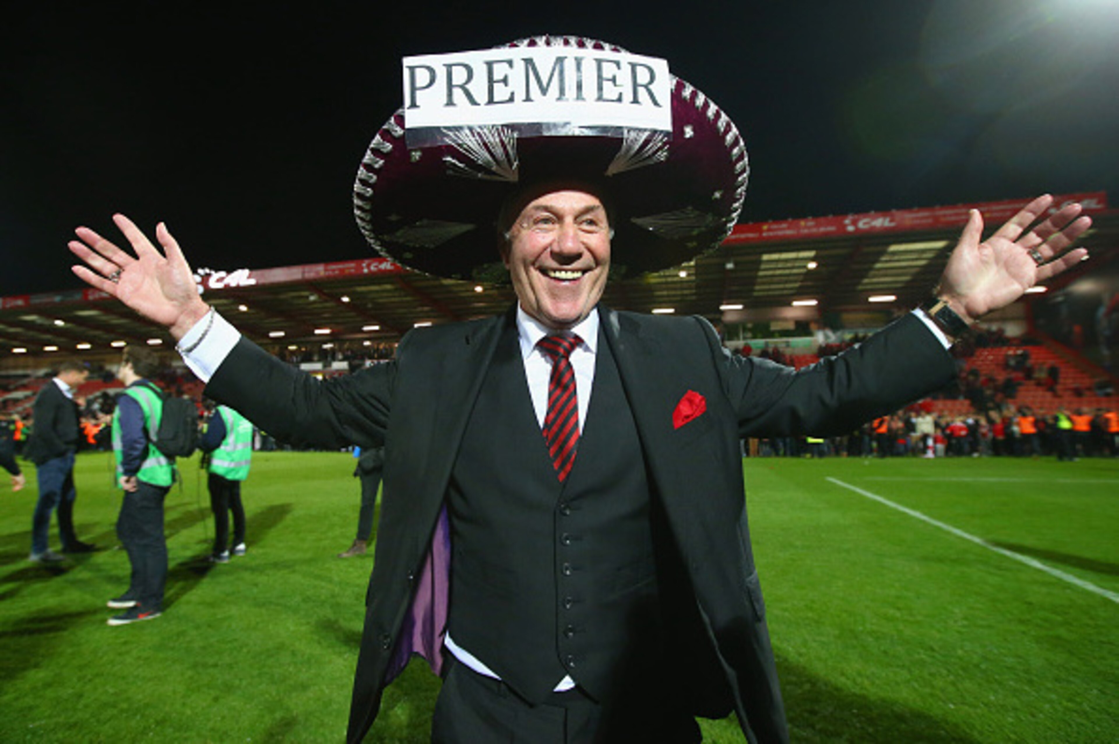 BOURNEMOUTH, ENGLAND - APRIL 27:  Bournemouth chairman Jeff Mostyn celebrates victory on the pitch after the Sky Bet Championship match between AFC Bournemouth and Bolton Wanderers at Goldsands Stadium on April 27, 2015 in Bournemouth, England. Bournemout