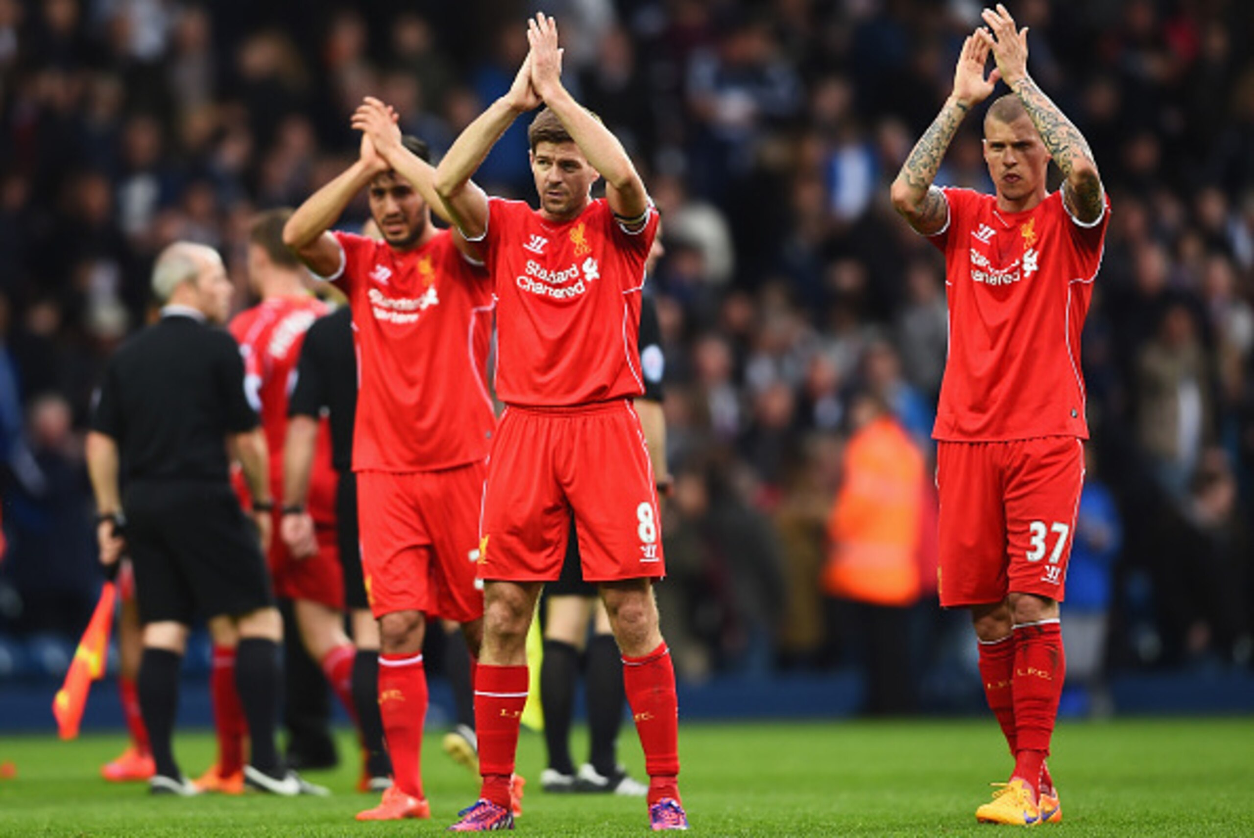 WEST BROMWICH, ENGLAND - APRIL 25: Steven Gerrard of Liverpool and Martin Skrtel of Liverpool applaud the fans after the 0-0 draw in the Barclays Premier League match between West Bromwich Albion and Liverpool at The Hawthorns on April 25, 2015 in West Br WEST BROMWICH, ENGLAND - APRIL 25: Steven Gerrard of Liverpool and Martin Skrtel of Liverpool applaud the fans after the 0-0 draw in the Barclays Premier League match between West Bromwich Albion and Liverpool at The Hawthorns on April 25, 2015 in West Br