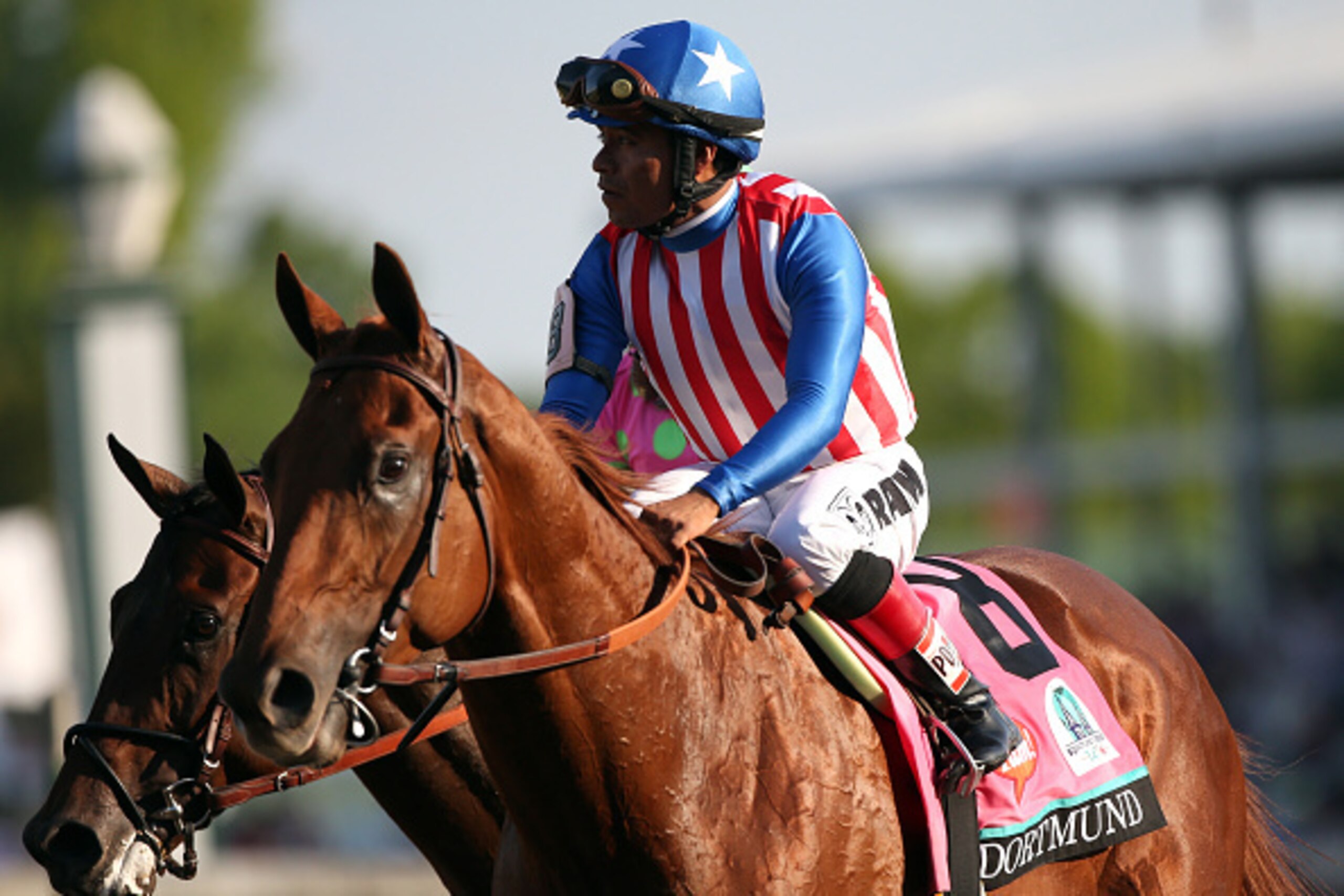 LOUISVILLE, KY - MAY 02:  Jockey Martin Garcia guides Dortmund #8 on the track after placing thrid in the 141st running of the Kentucky Derby at Churchill Downs on May 2, 2015 in Louisville, Kentucky.  (Photo by Chris Graythen/Getty Images)