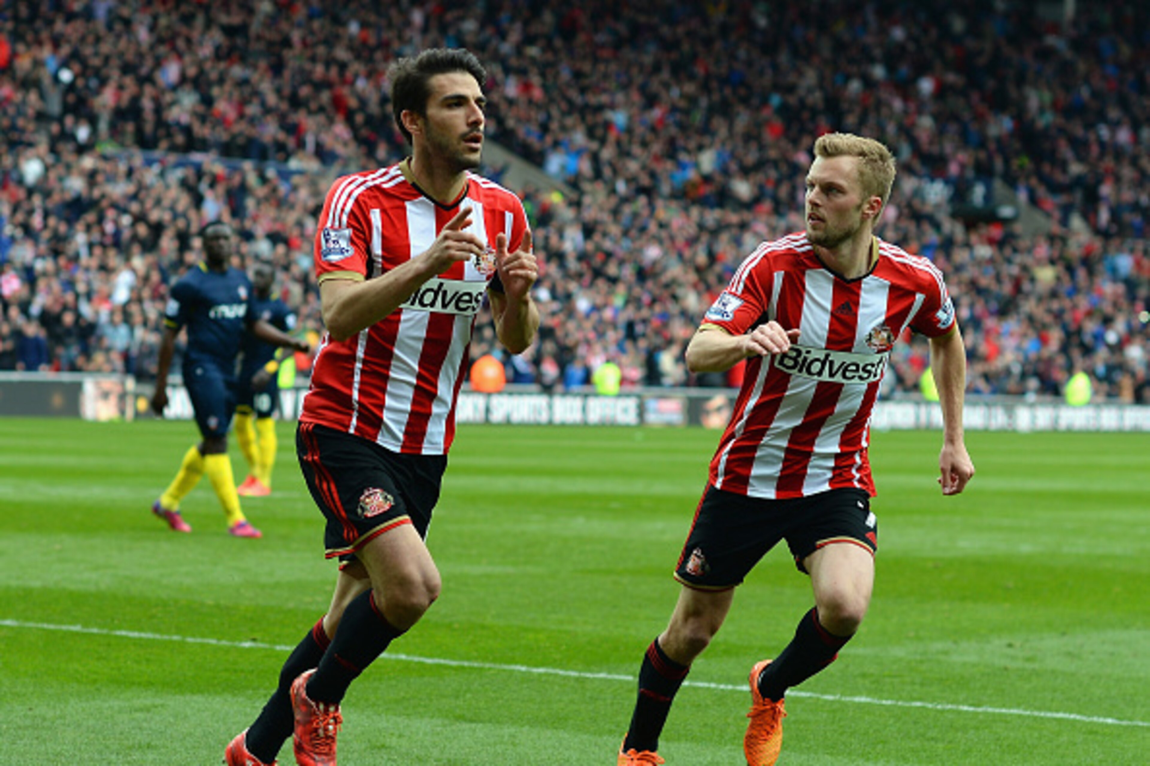 SUNDERLAND, ENGLAND - MAY 02: Jordi Gomez (L) of Sunderland celebrates his second goal with Sebastian Larsson during the Barclays Premier League match between Sunderland and Southampton at Stadium of Light on May 2, 2015 in Sunderland, England.  (Photo by