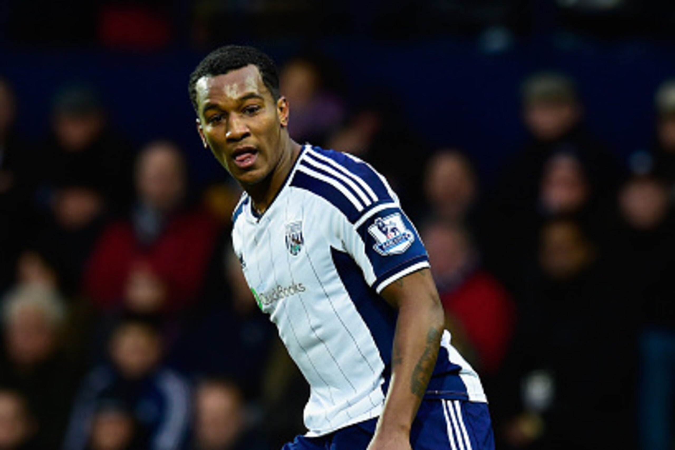 WEST BROMWICH, ENGLAND - JANUARY 31:  WBA player Andre Wisdom in action during the Barclays Premier League match between West Bromwich Albion and Tottenham Hotspur at The Hawthorns on January 31, 2015 in West Bromwich, England.  (Photo by Stu Forster/Gett