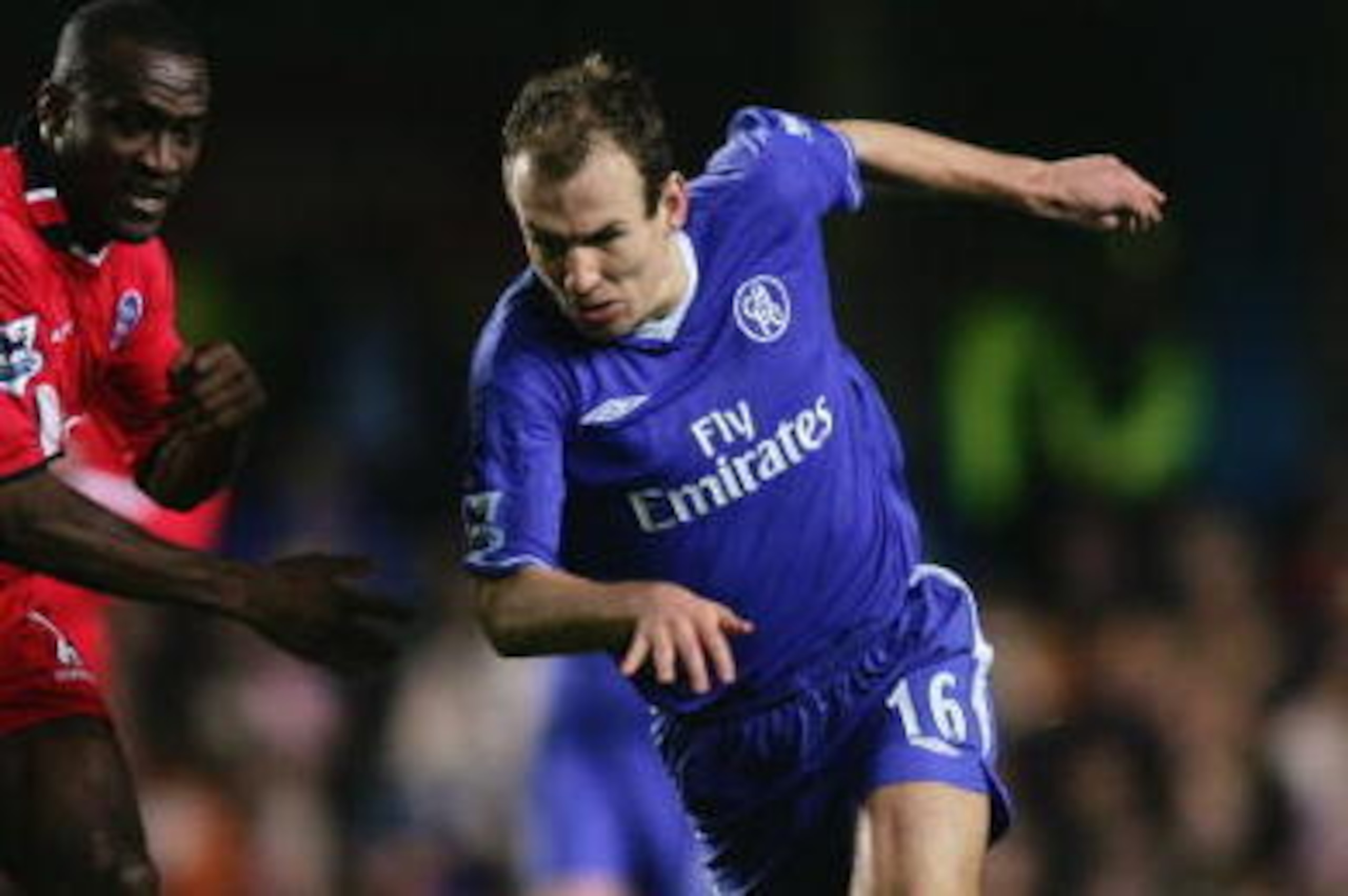 LONDON - JANUARY 30:  Olivier Tebily of Birmingham City battles with Arjen Robben of Chelsea during the FA Cup Fourth Round match between Chelsea and Birmingham City at Stamford Bridge on January 30, 2005 in London, England.  (Photo by Ben Radford/Getty I