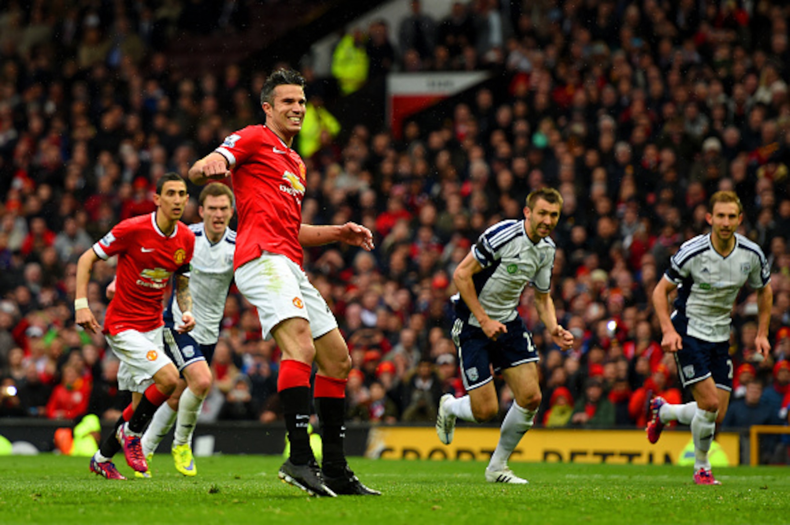 MANCHESTER, ENGLAND - MAY 02:  Robin van Persie of Manchester United reacts after taking a penalty which is saved by Boaz Myhill of West Brom during the Barclays Premier League match between Manchester United and West Bromwich Albion at Old Trafford on Ma