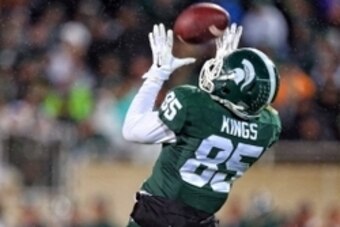 Oct 4, 2014; East Lansing, MI, USA; Michigan State Spartans wide receiver Macgarrett Kings Jr. (85) attempts to make a fair catch the 2nd half of a game at Spartan Stadium. Mandatory Credit: MSU won 27-22. Mike Carter-USA TODAY Sports