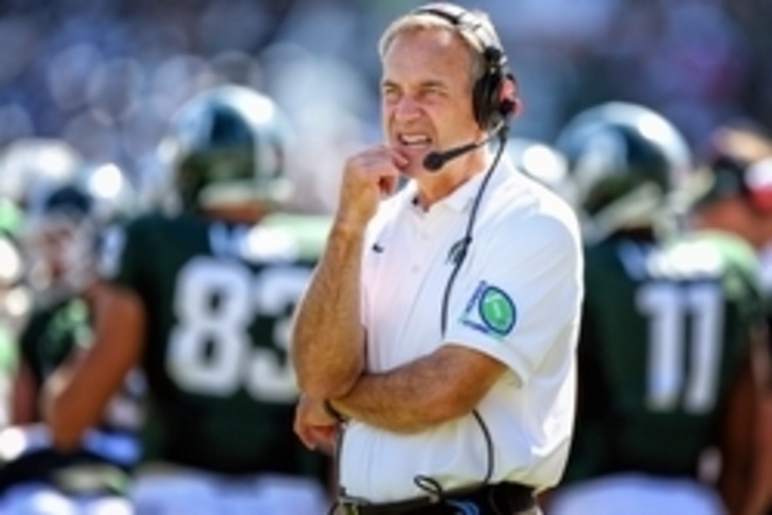 Sep 27, 2014; East Lansing, MI, USA; Michigan State Spartans head coach Mark Dantonio walks the sidelines during the 2nd half of a game against the Wyoming Cowboys at Spartan Stadium. MSU won 56-14. Mandatory Credit: Mike Carter-USA TODAY Sports