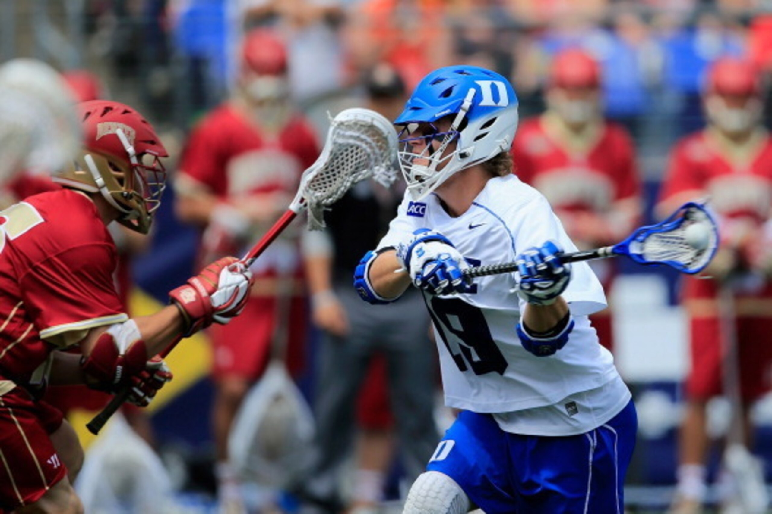 BALTIMORE, MD - MAY 24: Christian Walsh #19 of the Duke Blue Devils (C) scores a second half goal against the Denver Pioneers during the semifinals of the 2014 NCAA Division I Men's Lacrosse Championship at M&T Bank Stadium on May 24, 2014 in Baltimore, BALTIMORE, MD - MAY 24: Christian Walsh #19 of the Duke Blue Devils (C) scores a second half goal against the Denver Pioneers during the semifinals of the 2014 NCAA Division I Men's Lacrosse Championship at M&T Bank Stadium on May 24, 2014 in Baltimore,