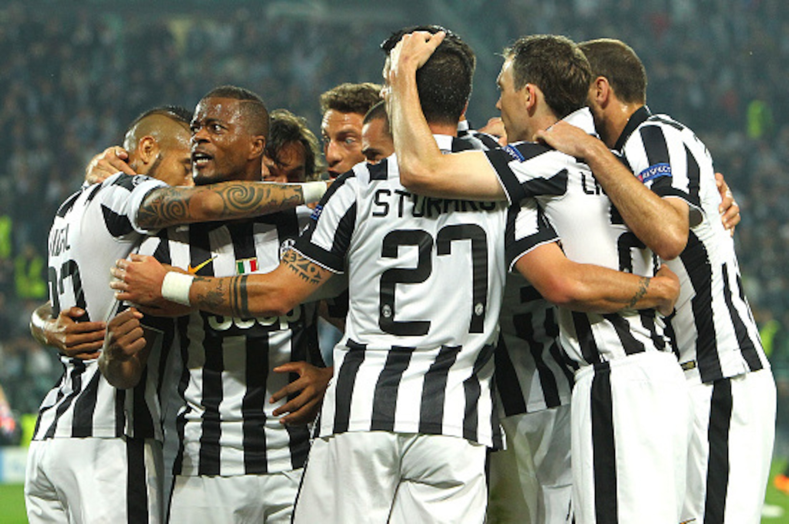 TURIN, ITALY - MAY 05:  Alvaro Morata of Juventus FC celebrates with his team-mates after scoring the opening goal during the UEFA Champions League semi final match between Juventus and Real Madrid CF at Juventus Arena on May 5, 2015 in Turin, Italy.  (Ph