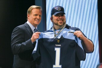 CHICAGO, IL - APRIL 30:  NFL Commissioner Roger Goodell holds up a jersey after the Tennessee Titans chose Marcus Mariota of the Oregon Ducks #2 overall during the first round of the 2015 NFL Draft at the Auditorium Theatre of Roosevelt University on Apri