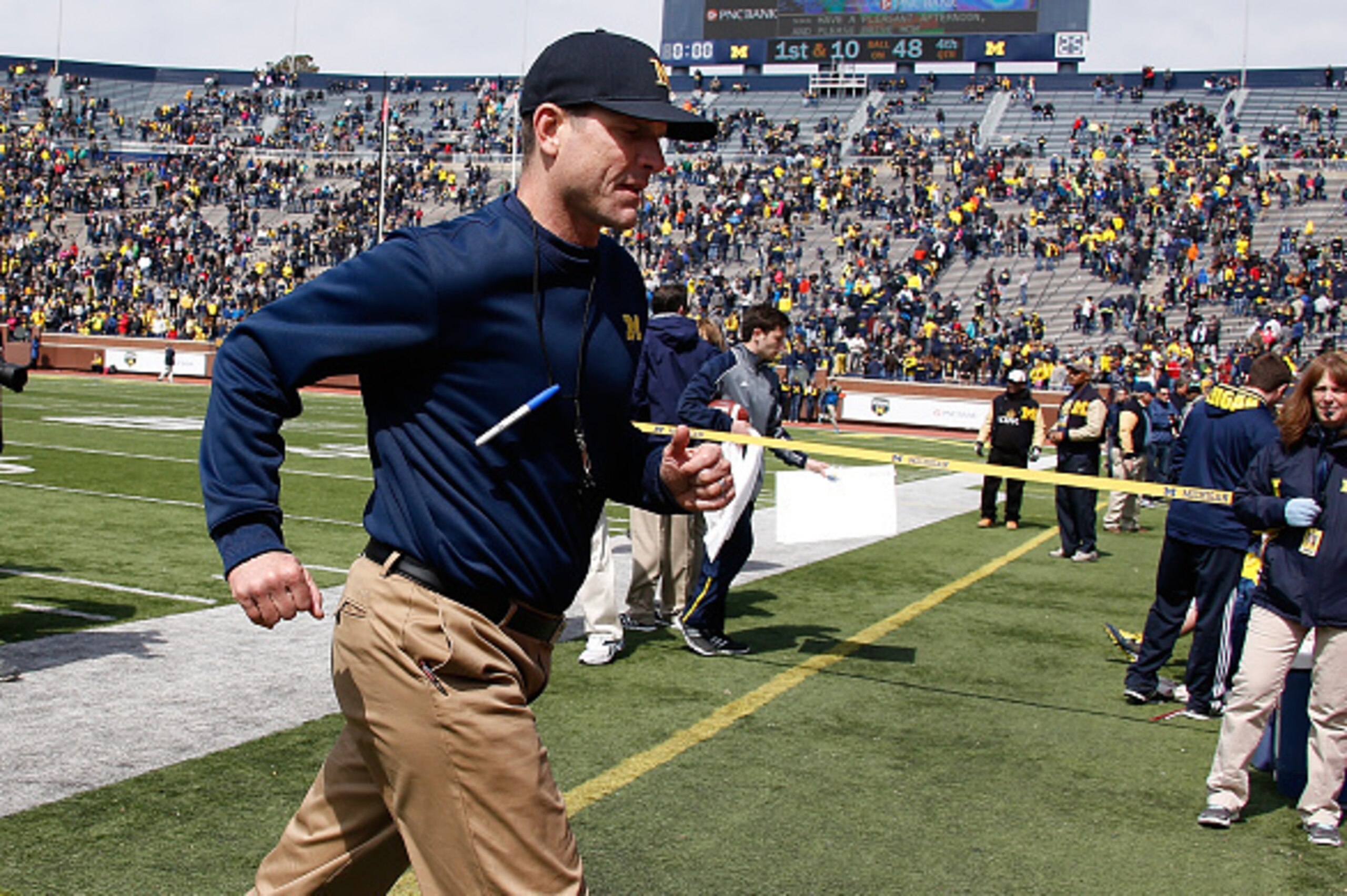 ANN ARBOR, MI - APRIL 04: Head coach Jim Harbaugh of the Michigan Wolverines leaves the field after the Michigan Football Spring Game on April 4, 2015 at Michigan Stadium in Ann Arbor, Michigan. (Photo by Gregory Shamus/Getty Images) ANN ARBOR, MI - APRIL 04: Head coach Jim Harbaugh of the Michigan Wolverines leaves the field after the Michigan Football Spring Game on April 4, 2015 at Michigan Stadium in Ann Arbor, Michigan. (Photo by Gregory Shamus/Getty Images)