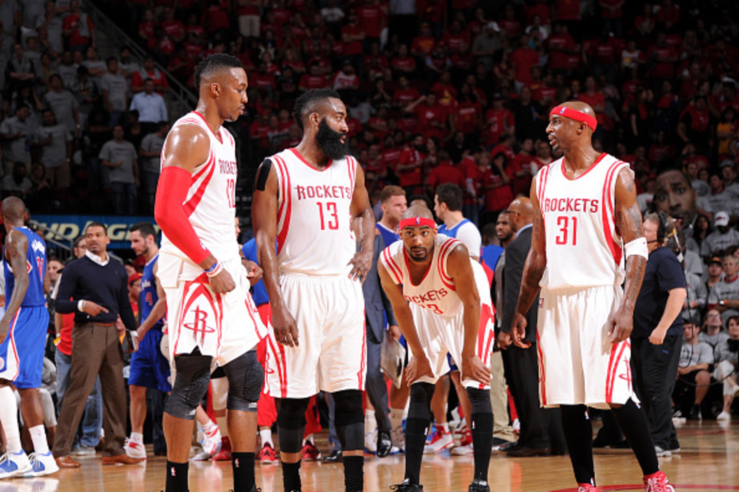 HOUSTON, TX - MAY 4:  (L-R) Dwight Howard #12, James Harden #13, Corey Brewer #33, and Jason Terry #31 of the Houston Rockets during the game against the Los Angeles Clippers in Game One of the Western Conference Semifinals during the 2015 NBA Playoffs on