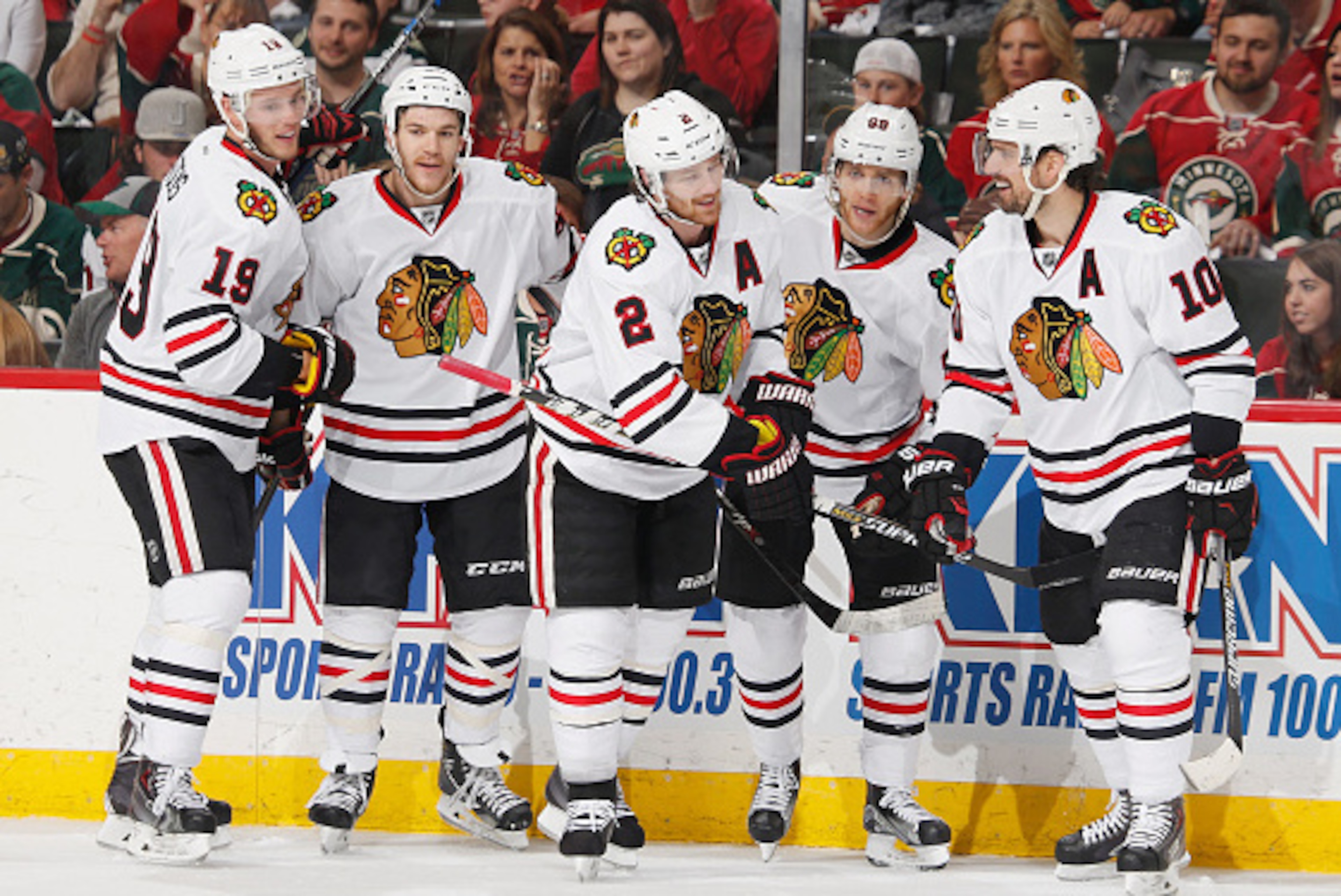 ST. PAUL, MN - MAY 5: (L-R) Jonathan Toews #19, Andrew Shaw #65, Duncan Keith #2, Patrick Kane #88, and Patrick Sharp #10 of the Chicago Blackhawks celebrate after scoring a goal against the Minnesota Wild in Game Three of the Western Conference Semifinal