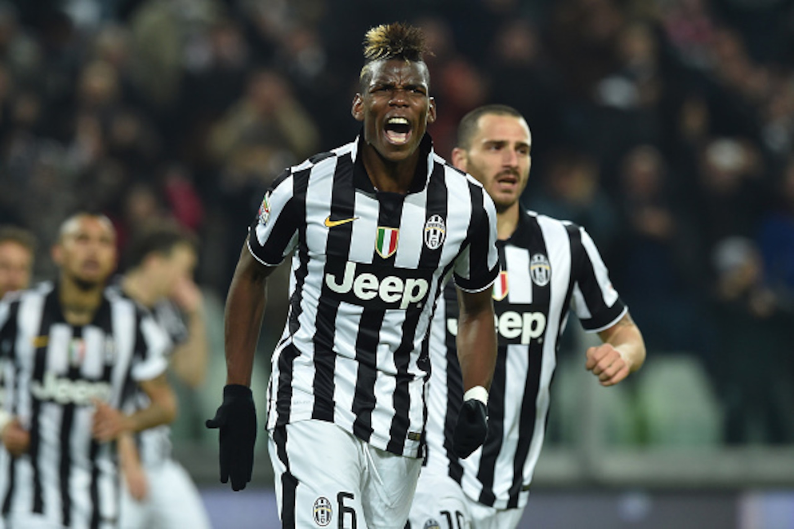 TURIN, ITALY - MARCH 09:  Paul Pogba of Juventus FC celebrates after scoring the opening goal during the Serie A match between Juventus FC and US Sassuolo Calcio at Juventus Arena on March 9, 2015 in Turin, Italy.  (Photo by Valerio Pennicino/Getty Images