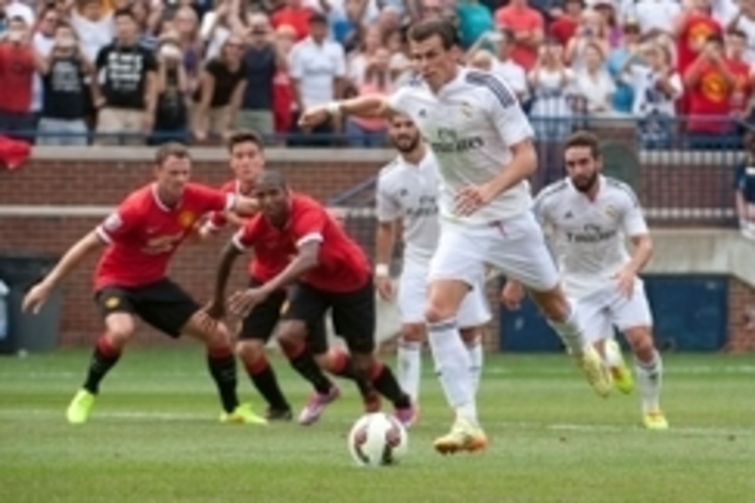 Aug 2, 2014; Ann Arbor, MI, USA; Real Madrid middle fielder Gareth Bale (11) scores on a penalty kick during the first half against the Manchester United at Michigan Stadium. Mandatory Credit: Tim Fuller-USA TODAY Sports