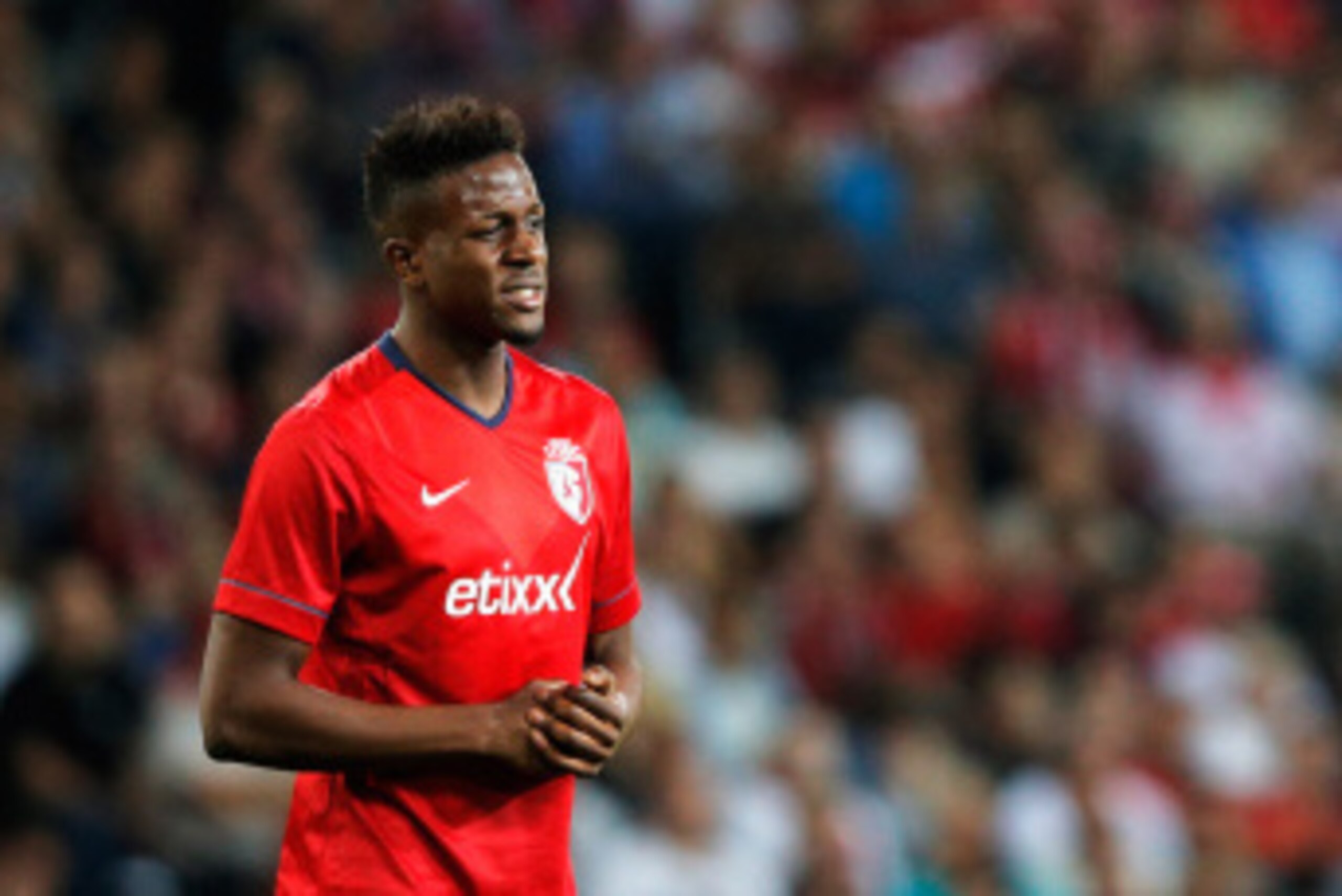 LILLE, FRANCE - AUGUST 05:  Divock Origi of Lille looks on during the UEFA Champions League third qualifying round 2nd leg match between LOSC Lille and Grasshopper Club Zurich at the Stade Pierre-Mauroy on August 5, 2014 in Lille, France.  (Photo by Dean 
