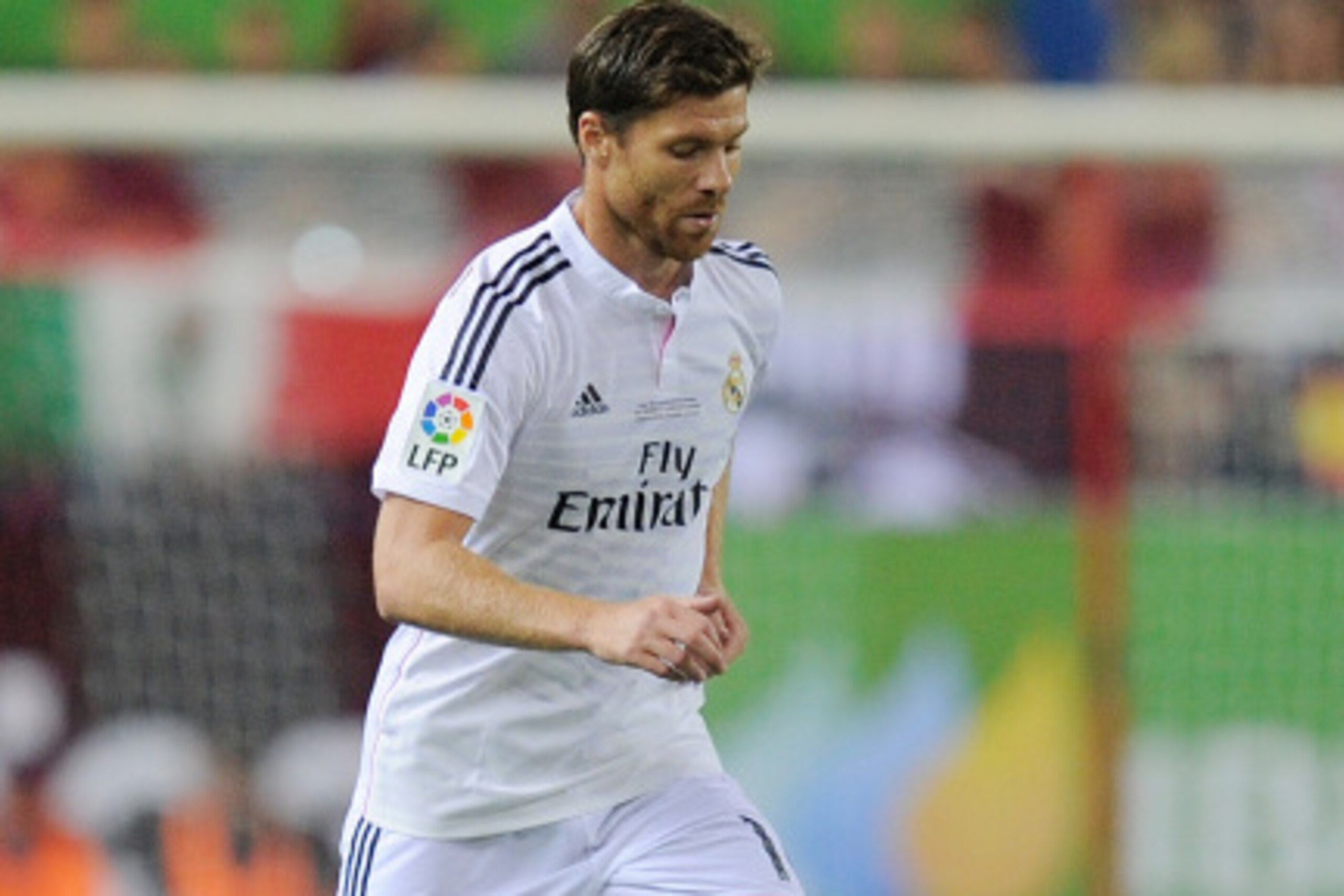 MADRID, SPAIN - AUGUST 22:  Xabi Alonso of Real Madrid in action during the Supercopa, second leg match between Club Atletico de Madrid and Real Madrid at Vicente Caldron stadium on August 22, 2014 in Madrid, Spain.  (Photo by Denis Doyle/Getty Images)