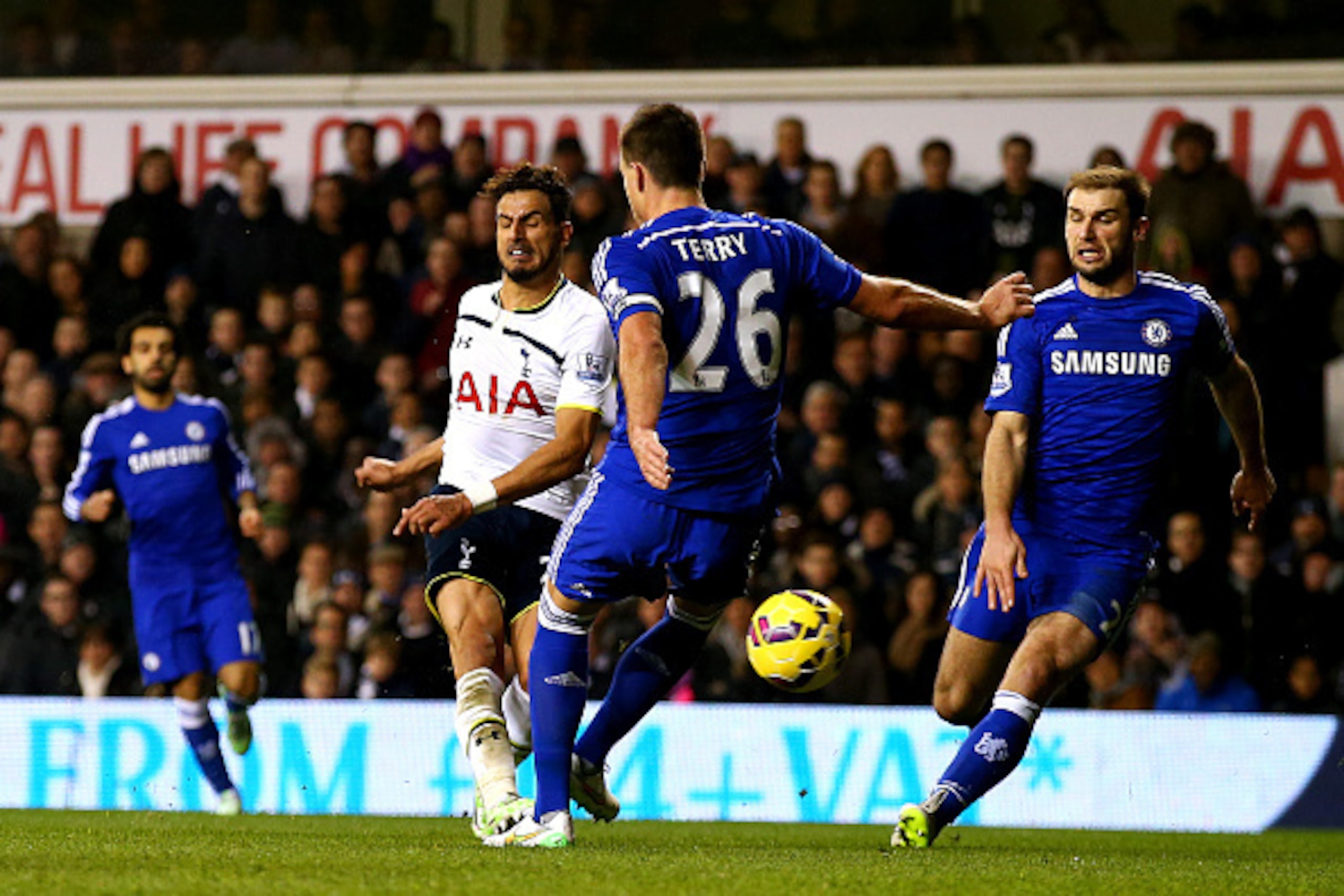 LONDON, ENGLAND - JANUARY 01:  Nacer Chadli of Spurs scores his team's fifth goal during the Barclays Premier League match between Tottenham Hotspur and Chelsea at White Hart Lane on January 1, 2015 in London, England.  (Photo by Clive Rose/Getty Images)