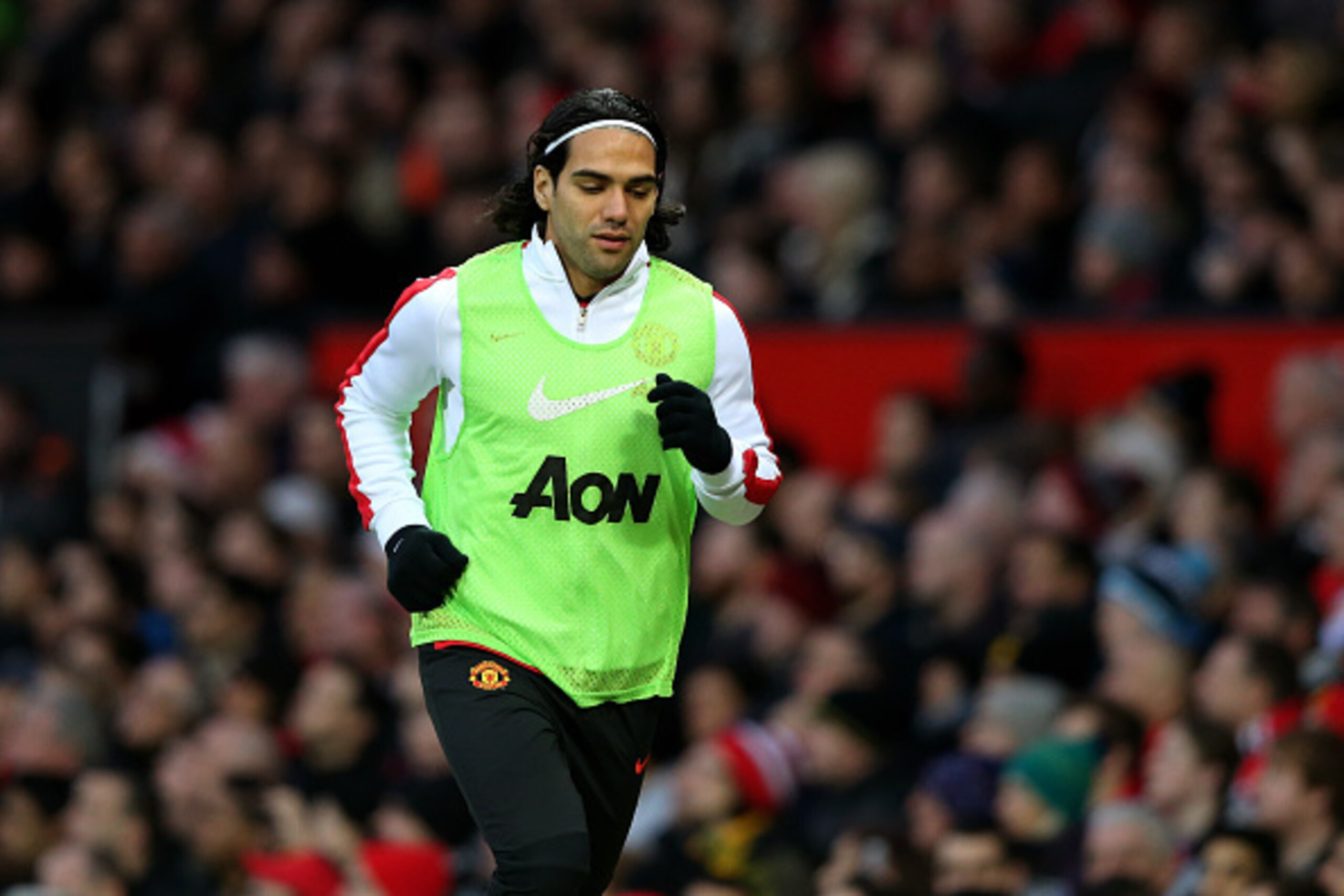 MANCHESTER, ENGLAND - MARCH 15: Substitute Radamel Falcao of Manchester United warms up prior to coming on in the second half during the Barclays Premier League match between Manchester United and Tottenham Hotspur at Old Trafford on March 15, 2015 in Ma MANCHESTER, ENGLAND - MARCH 15: Substitute Radamel Falcao of Manchester United warms up prior to coming on in the second half during the Barclays Premier League match between Manchester United and Tottenham Hotspur at Old Trafford on March 15, 2015 in Ma