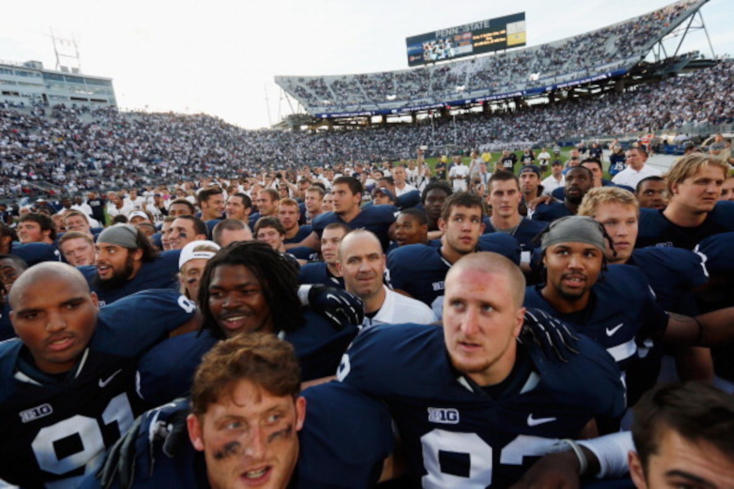 STATE COLLEGE, PA - SEPTEMBER 15:  Head coach Bill O'Brien of the Penn State Nittany Lions (C) sings the schools fight song with the team after defeating the Navy Midshipmen 34-7 at Beaver Stadium on September 15, 2012 in State College, Pennsylvania.  (Ph