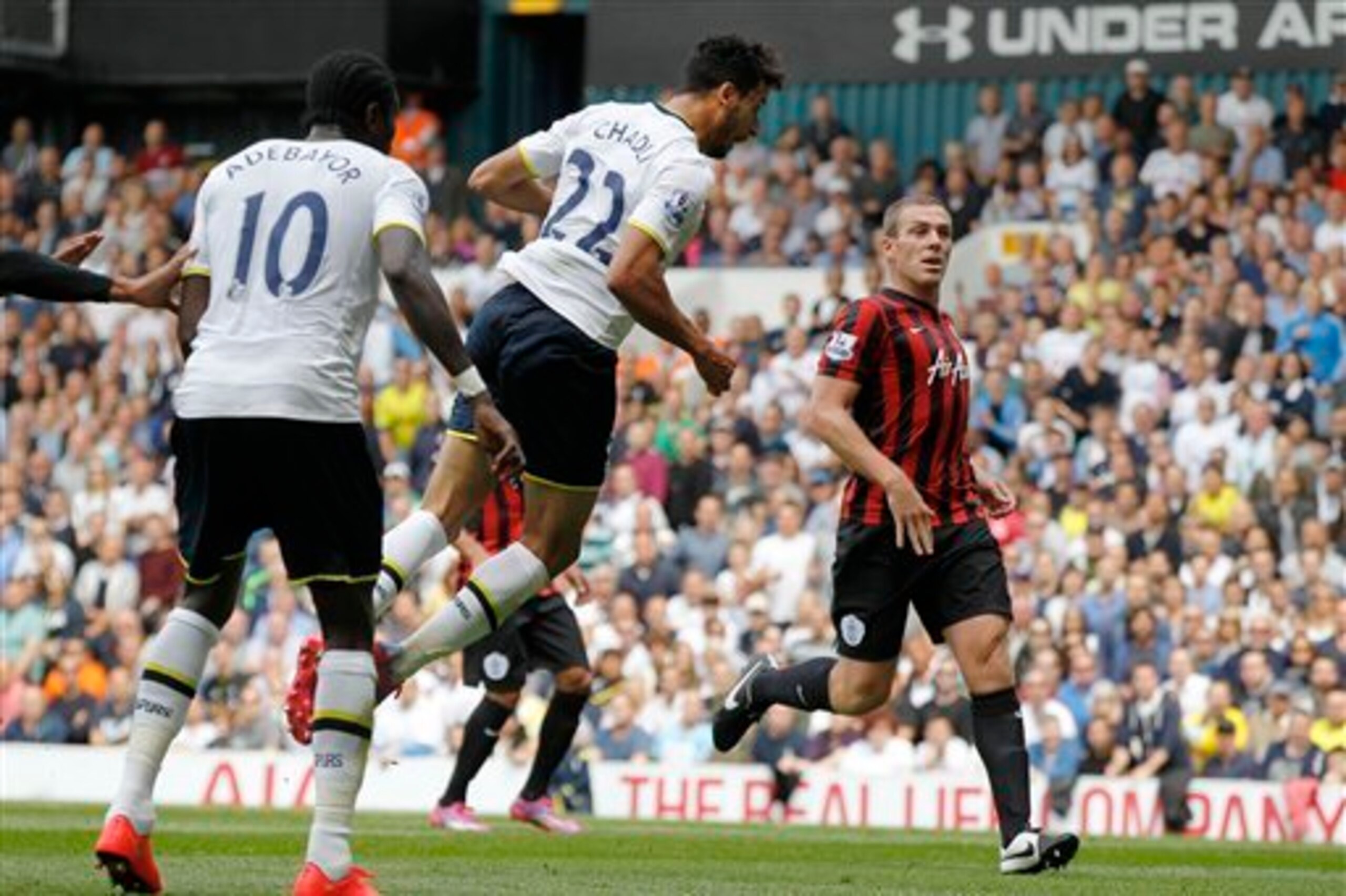 Chadli heads in one of two goals in Spurs' 4-0 win over QPR last August.