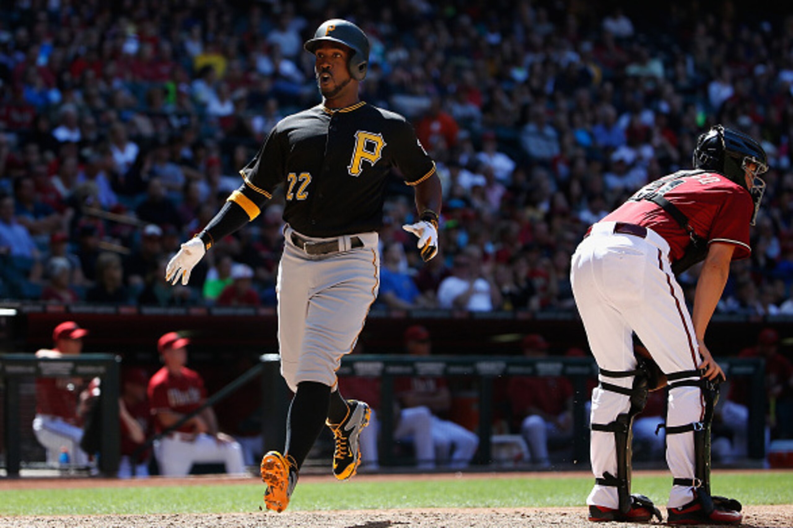 PHOENIX, AZ - APRIL 26:  Andrew McCutchen #22 of the Pittsburgh Pirates scores a fifth inning run against the Arizona Diamondbacks during the MLB game at Chase Field on April 26, 2015 in Phoenix, Arizona. The Pirates defeated the Diamondbacks 8-0. (Photo 