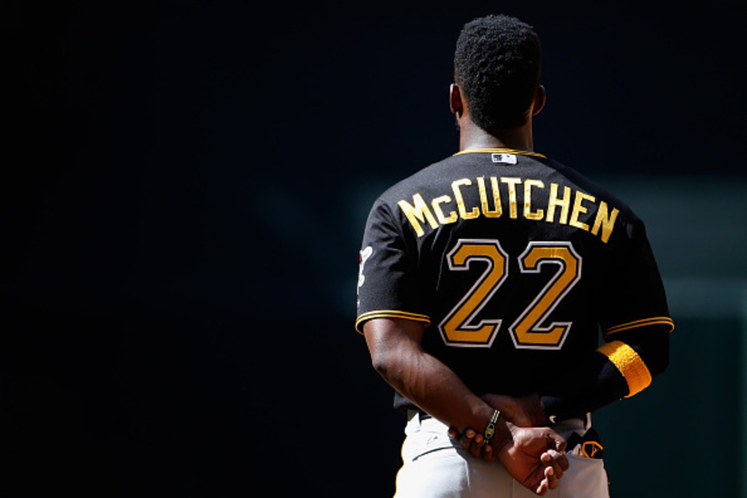 PHOENIX, AZ - APRIL 26:  Andrew McCutchen #22 of the Pittsburgh Pirates stands attended for 'God Bless America' during the seventh inning of MLB game against the Arizona Diamondbacks at Chase Field on April 26, 2015 in Phoenix, Arizona. The Pirates defeat
