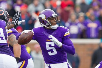 Dec 28, 2014; Minneapolis, MN, USA; Minnesota Vikings quarterback Teddy Bridgewater (5) throws in the second quarter against the Chicago Bears at TCF Bank Stadium. Mandatory Credit: Brad Rempel-USA TODAY Sports