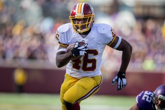 Nov 2, 2014; Minneapolis, MN, USA; Washington Redskins running back Alfred Morris (46) rushes for a touchdown against the Minnesota Vikings in the second quarter at TCF Bank Stadium. The Vikings win 29-26. Mandatory Credit: Bruce Kluckhohn-USA TODAY Sport