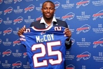 Mar 10, 2015; Orchard Park, NY, USA; Buffalo Bills running back LeSean McCoy holds up his new jersey after a press conference at Ralph Wilson Stadium. Mandatory Credit: Kevin Hoffman-USA TODAY Sports