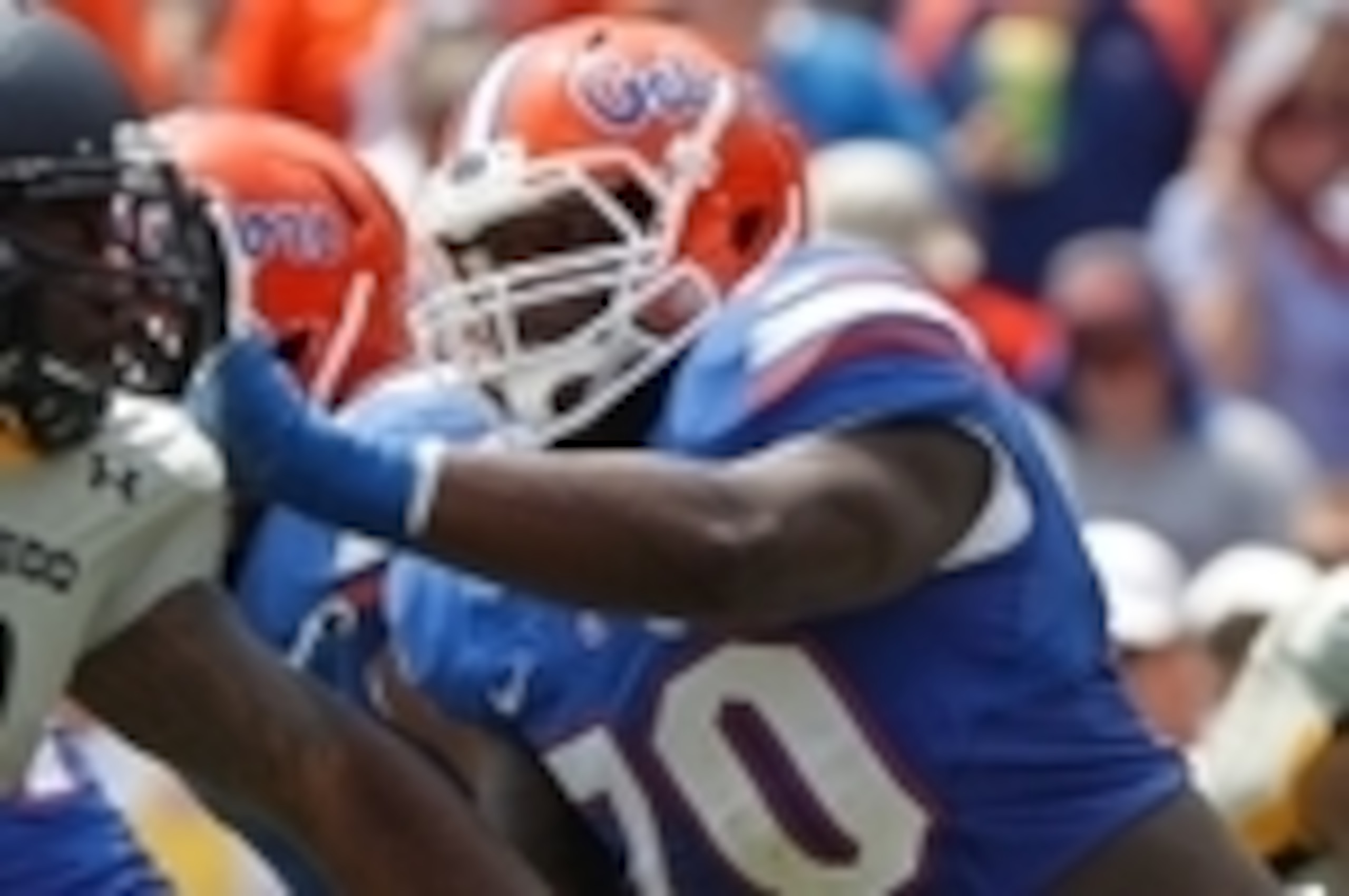 Aug 31, 2013; Gainesville, FL, USA; Florida Gators offensive linesman D.J. Humphries (70) blocks Toledo Rockets defensive end Christian Smith (9) during the second half at Ben Hill Griffin Stadium. Florida Gators defeated the Toledo Rockets 24-6. Mandator