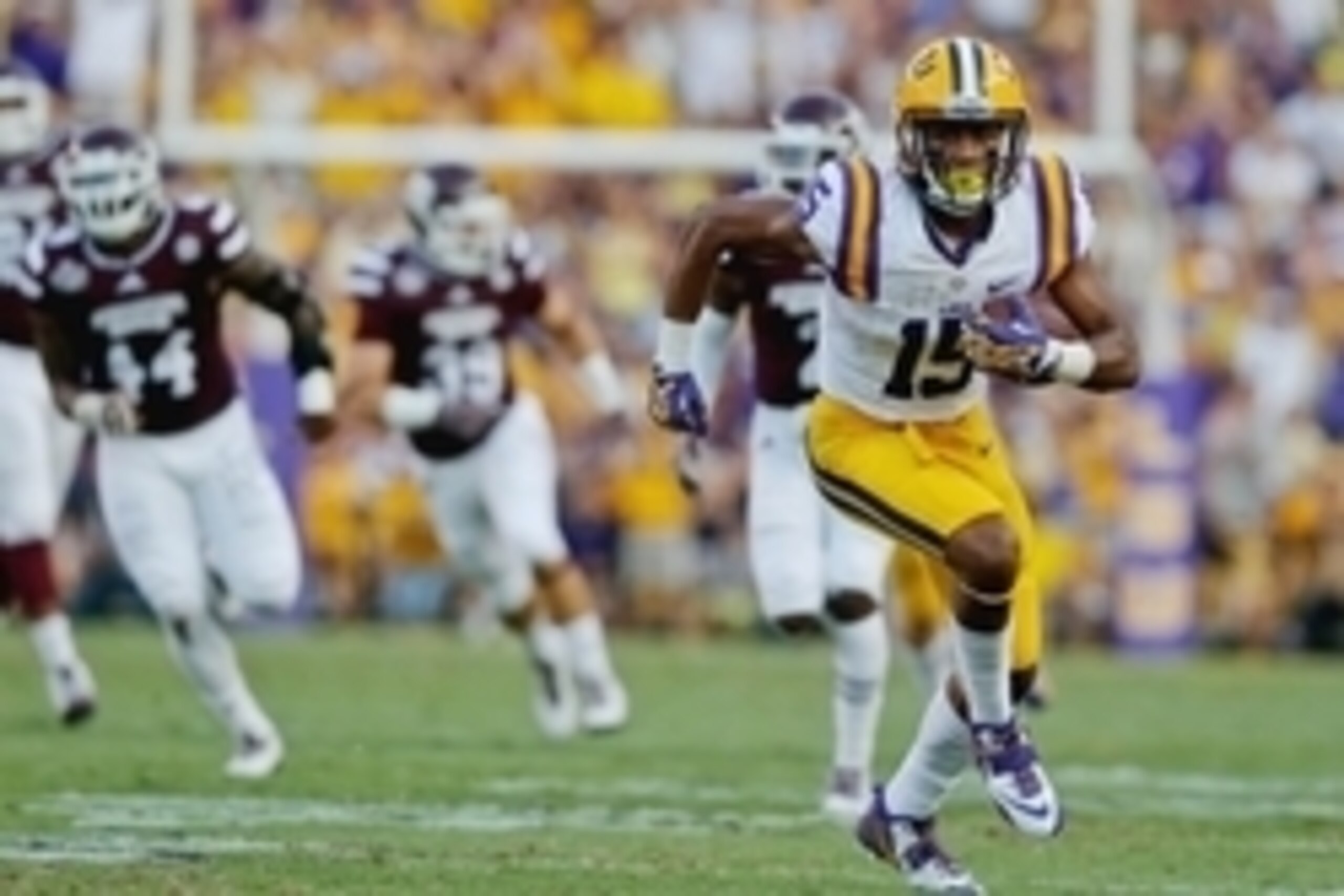 Sep 20, 2014; Baton Rouge, LA, USA; LSU Tigers wide receiver Malachi Dupre (15) runs after a catch against the Mississippi State Bulldogs during the first half of a game at Tiger Stadium. Mandatory Credit: Derick E. Hingle-USA TODAY Sports