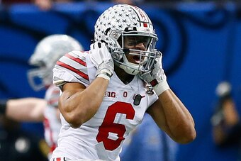NEW ORLEANS, LA - JANUARY 01:  Evan Spencer #6 of the Ohio State Buckeyes celebrates a 13 yard touchdown pass thrown to Michael Thomas #3 of the Ohio State Buckeyes late in the second quarter against the Alabama Crimson Tide during the All State Sugar Bow