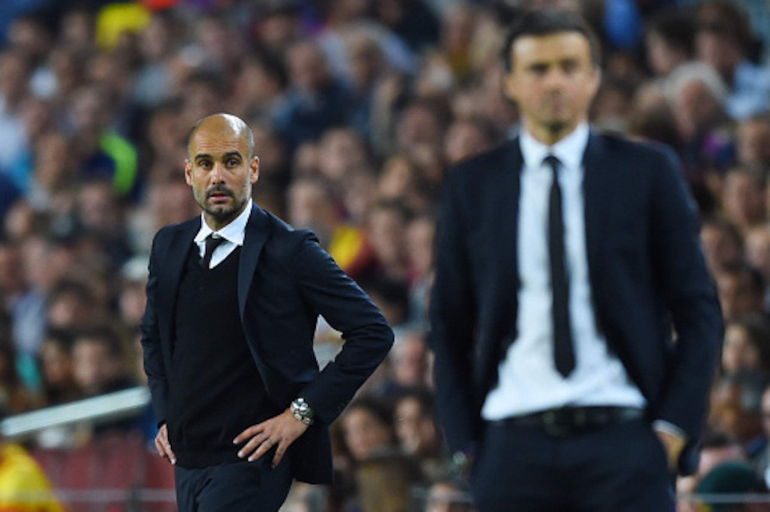 BARCELONA, SPAIN - MAY 06: A dejected Josep Guardiola the head coach of Bayern Muenchen looks on past Luis Enrique the head coach of Barcelona during the UEFA Champions League Semi Final, first leg match between FC Barcelona and FC Bayern Muenchen at Cam BARCELONA, SPAIN - MAY 06: A dejected Josep Guardiola the head coach of Bayern Muenchen looks on past Luis Enrique the head coach of Barcelona during the UEFA Champions League Semi Final, first leg match between FC Barcelona and FC Bayern Muenchen at Cam