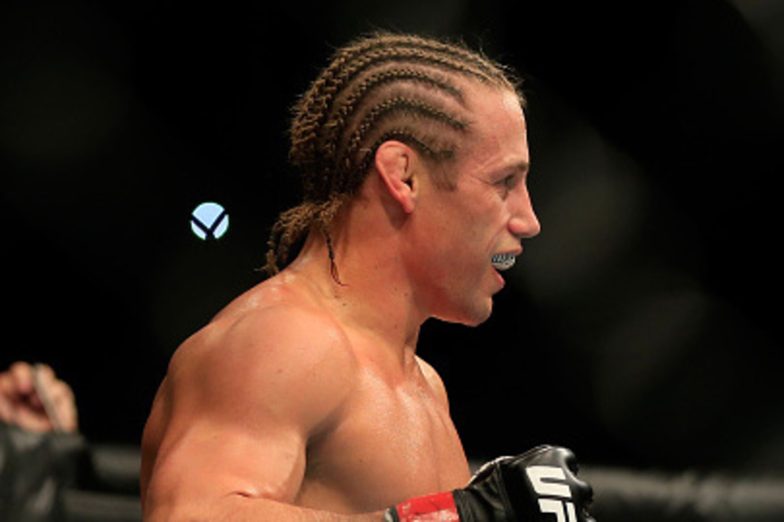 LAS VEGAS, NV - DECEMBER 06: Urijah Faber celebrates after defeating Francisco Rivera in their fight during the UFC 181 event at the Mandalay Bay Events Center on December 6, 2014 in Las Vegas, Nevada.  (Photo by Alex Trautwig/Getty Images)