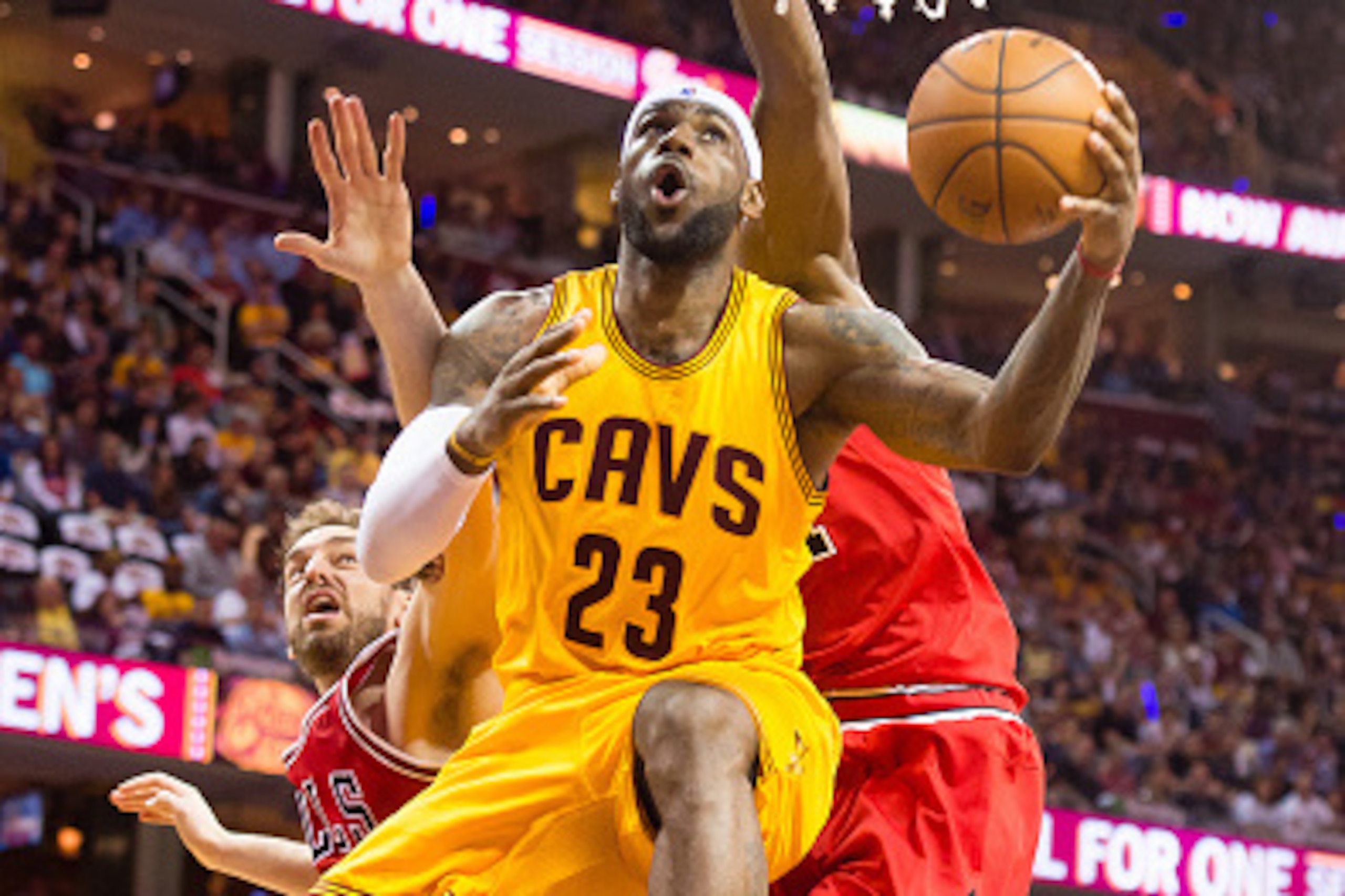 CLEVELAND, OH - MAY 6: LeBron James #23 of the Cleveland Cavaliers goes up for a shot against Pau Gasol #16 and Jimmy Butler #21 of the Chicago Bulls in the first half during Game Two in the Eastern Conference Semifinals of the 2015 NBA Playoffs 2015 at Q