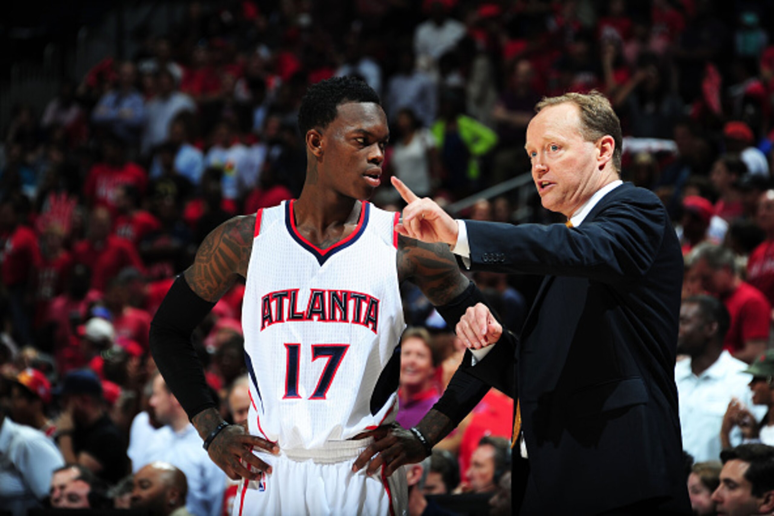 ATLANTA, GA - MAY 5: Dennis Schroder #17 and head coach Mike Budenholzer of the Atlanta Hawks during the game against the Washington Wizards in Game Two of the Eastern Conference Semifinals of the NBA Playoffs on May 5, 2015 at Philips Arena in Atlanta, G