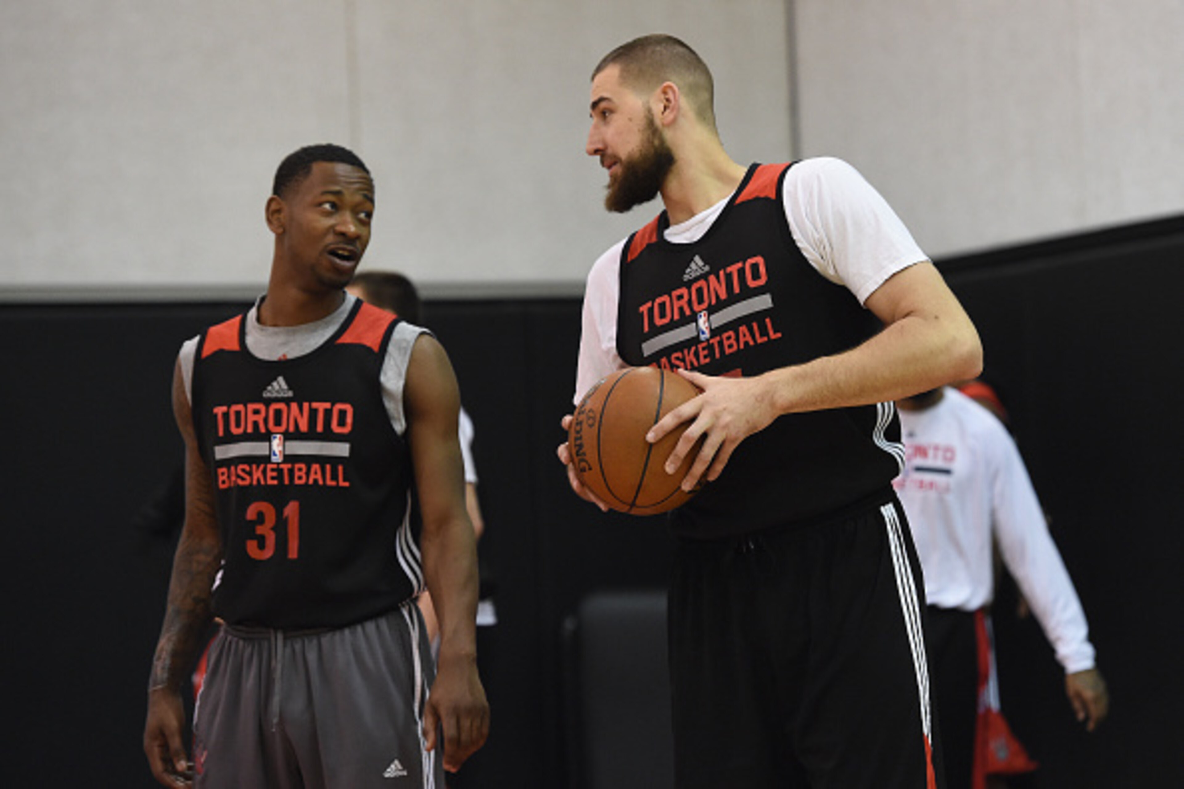 TORONTO, CANADA - April 17:  Terrence Ross #31 and Jonas Valanciunas #17 of the Toronto Raptors talk during an all access practice event on April 17, 2015 at the Air Canada Centre in Toronto, Ontario, Canada.  NOTE TO USER: User expressly acknowledges and