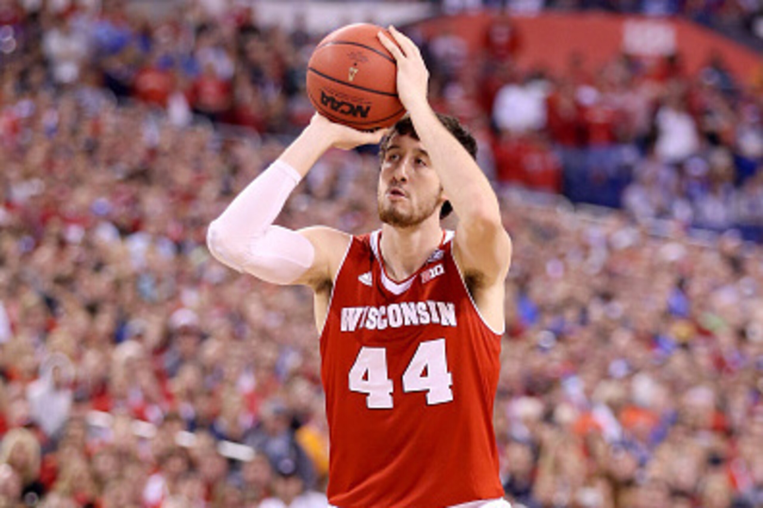 INDIANAPOLIS, IN - APRIL 06: Frank Kaminsky #44 of the Wisconsin Badgers shoots against Duke Blue Devils in the first half during the NCAA Men's Final Four National Championship at Lucas Oil Stadium on April 6, 2015 in Indianapolis, Indiana. (Photo by An INDIANAPOLIS, IN - APRIL 06: Frank Kaminsky #44 of the Wisconsin Badgers shoots against Duke Blue Devils in the first half during the NCAA Men's Final Four National Championship at Lucas Oil Stadium on April 6, 2015 in Indianapolis, Indiana. (Photo by An