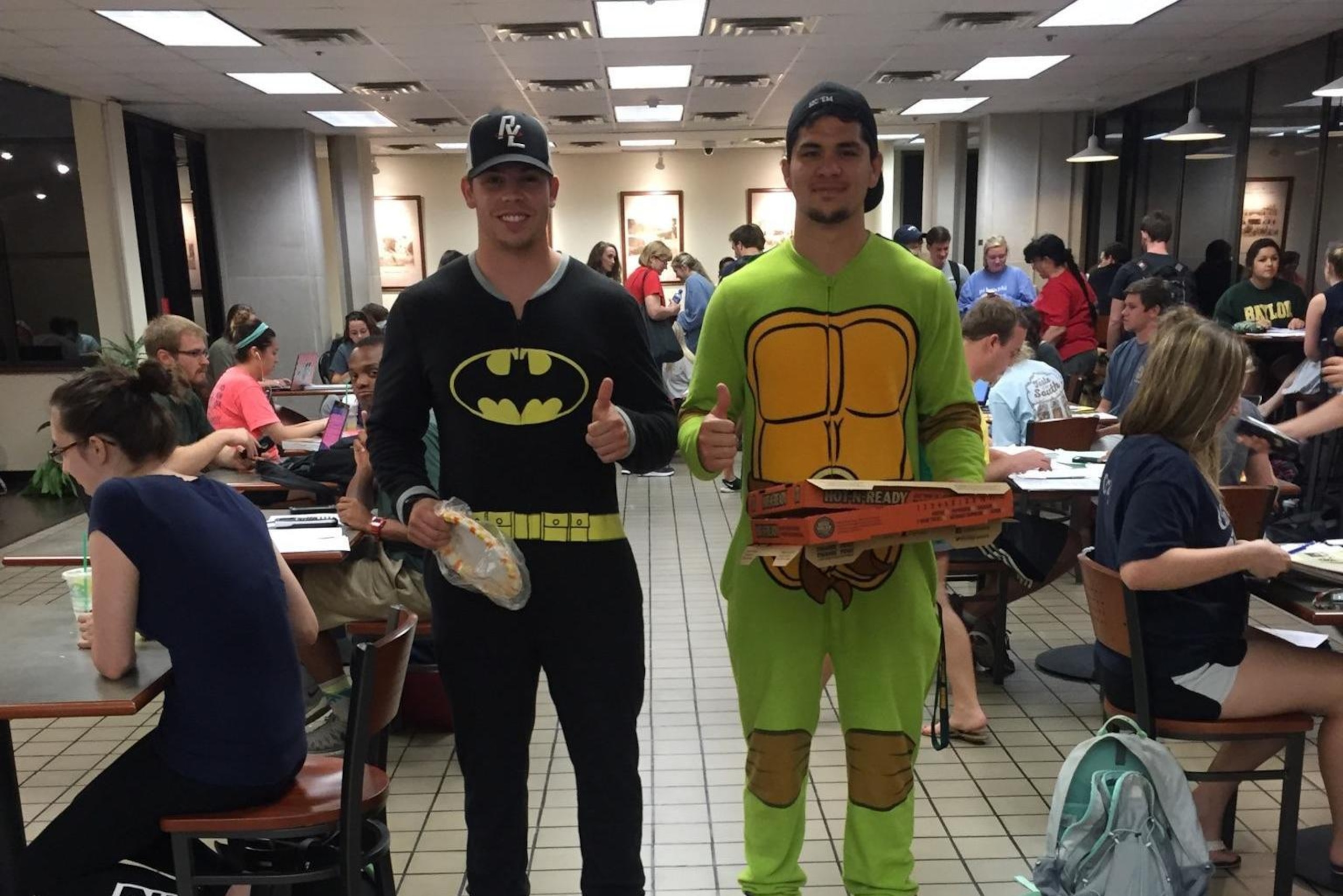 Wyatt Schrepfer and Silas Nacita delivering pizzas Wyatt Schrepfer and Silas Nacita delivering pizzas