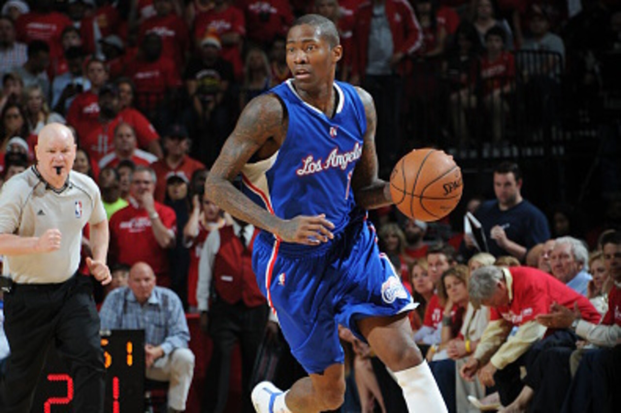 HOUSTON, TX - MAY 6:  Jamal Crawford #11 of the Los Angeles Clippers brings the ball up court against the Houston Rockets in Game Two of the Western Conference Semifinals during the 2015 NBA Playoffs on May 6, 2015 at the Toyota Center in Houston, Texas. 